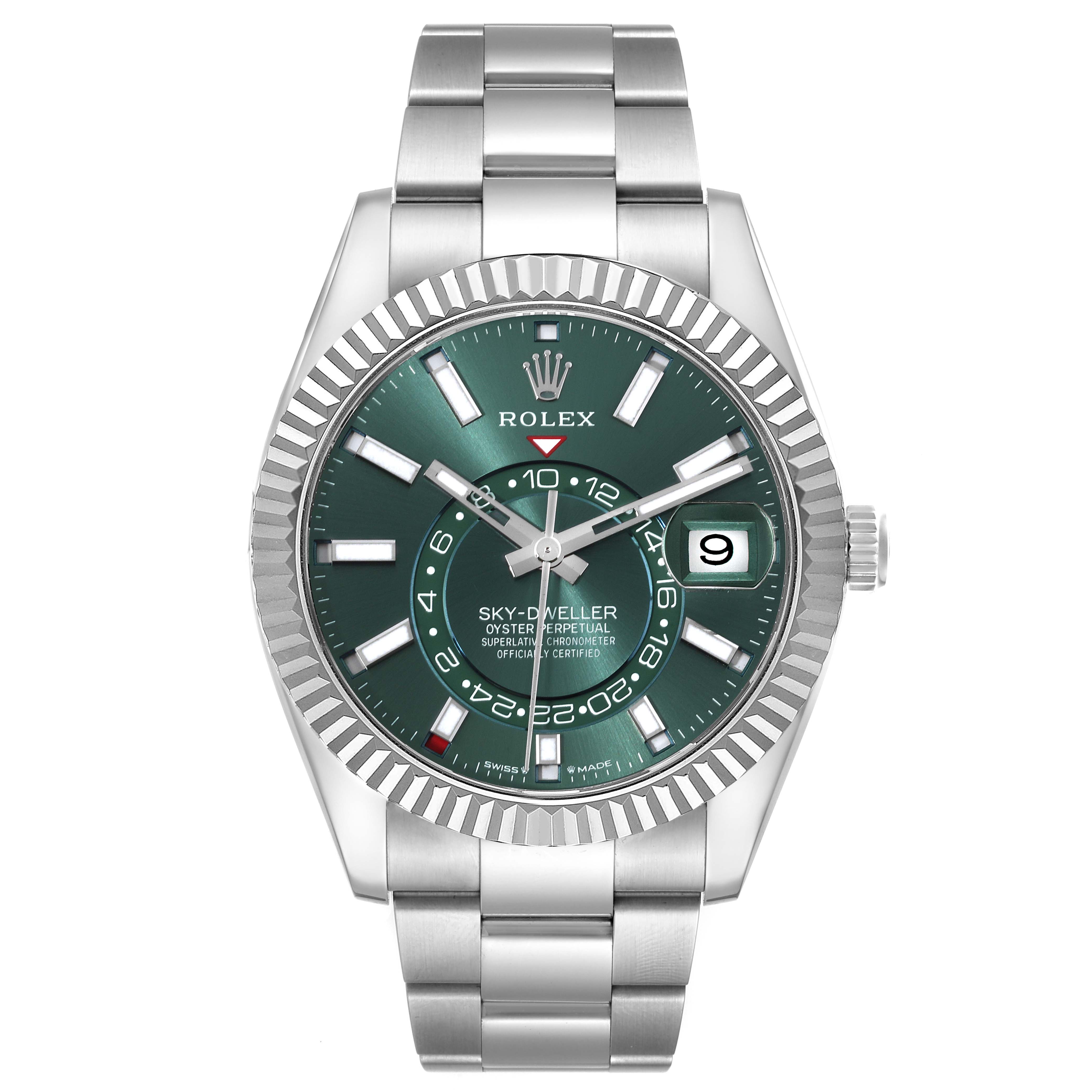 The Rolex Sky-Dweller 336934 Men
s Stainless Steel Green Dial 336934 Men
s Stainless Steel Green Dial watch is shown from a frontal view, highlighting its green dial, fluted bezel, and metal bracelet.