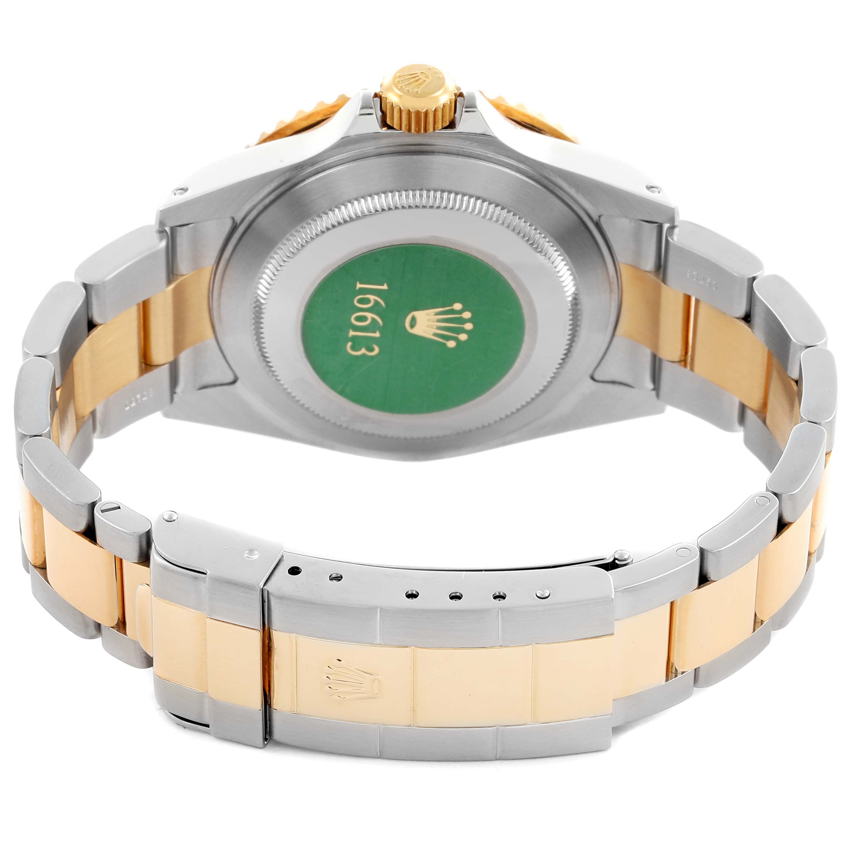 The Rolex Submariner 16613 Men's Steel and Gold (two tone) Blue Dial 16613 Men's Steel and Gold (two tone) Blue Dial is shown from the back, highlighting its case back, crown, and two-tone bracelet.