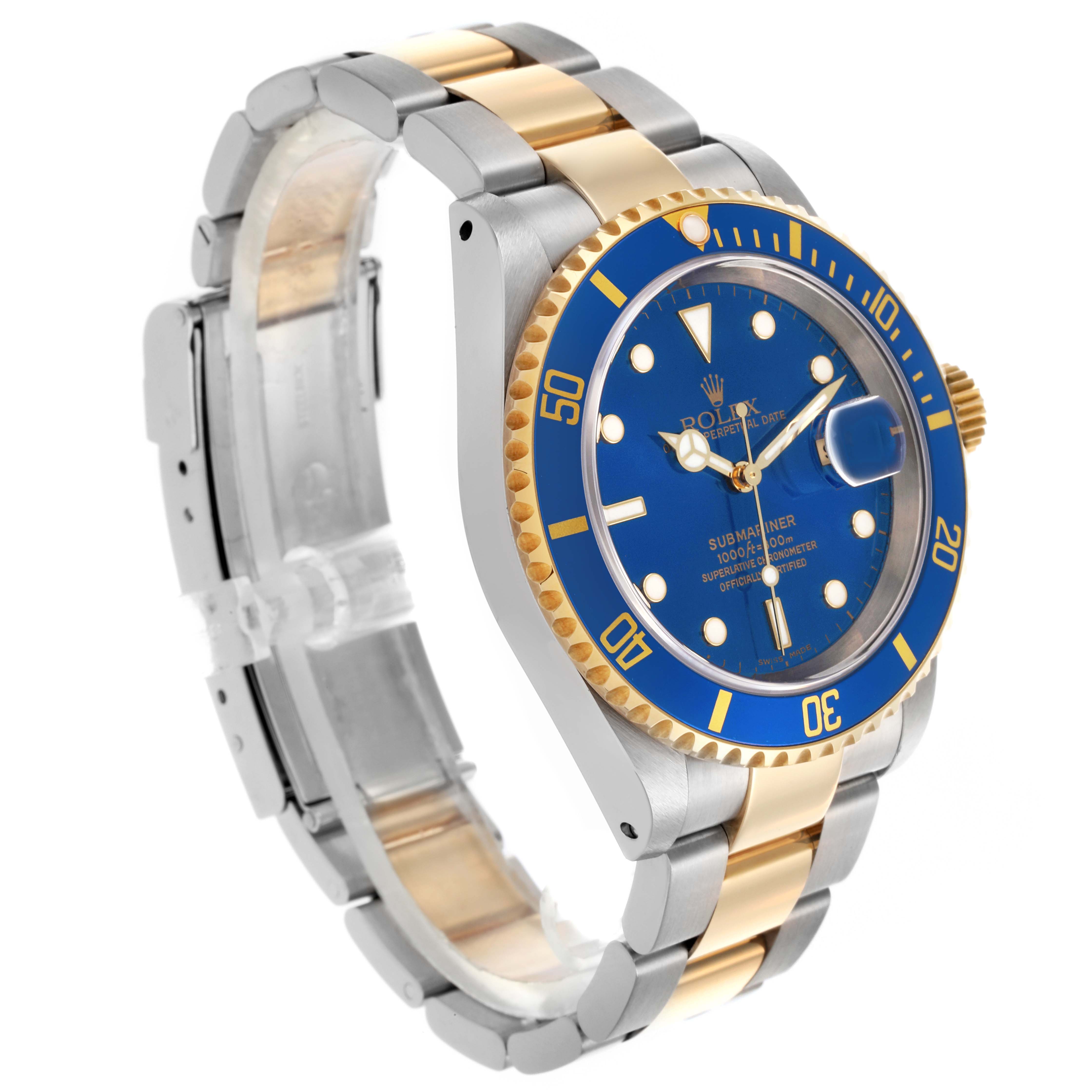 The Rolex Submariner 16613 Men's Steel and Gold (two tone) Blue Dial 16613 Men's Steel and Gold (two tone) Blue Dial is shown at an angle highlighting its blue dial, bezel, and two-tone bracelet.