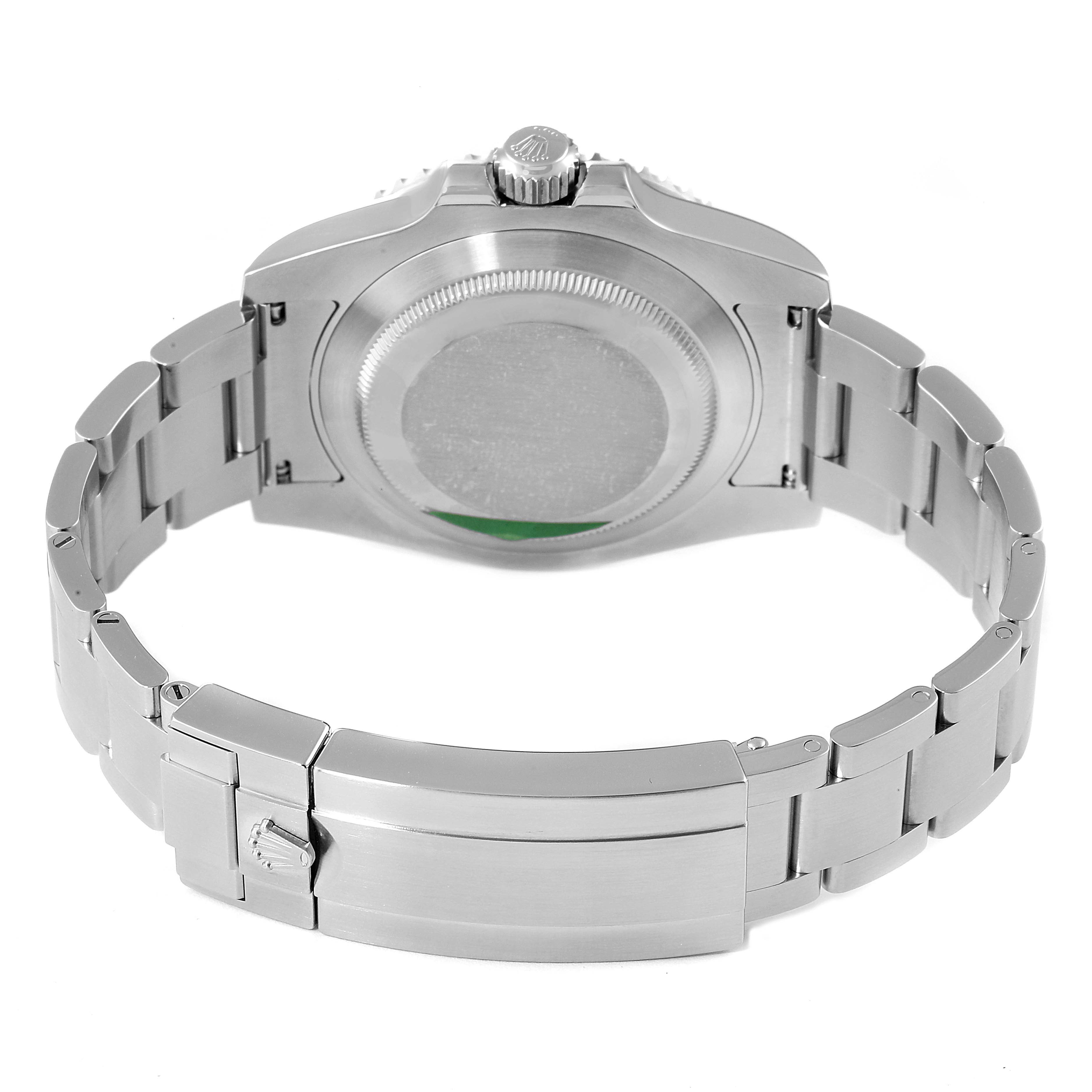 The image shows the back view of a Rolex Submariner 116610LV Men
s Stainless Steel Green Dial 116610LV Men
s Stainless Steel Green Dial watch, highlighting the case back, bracelet, and clasp.