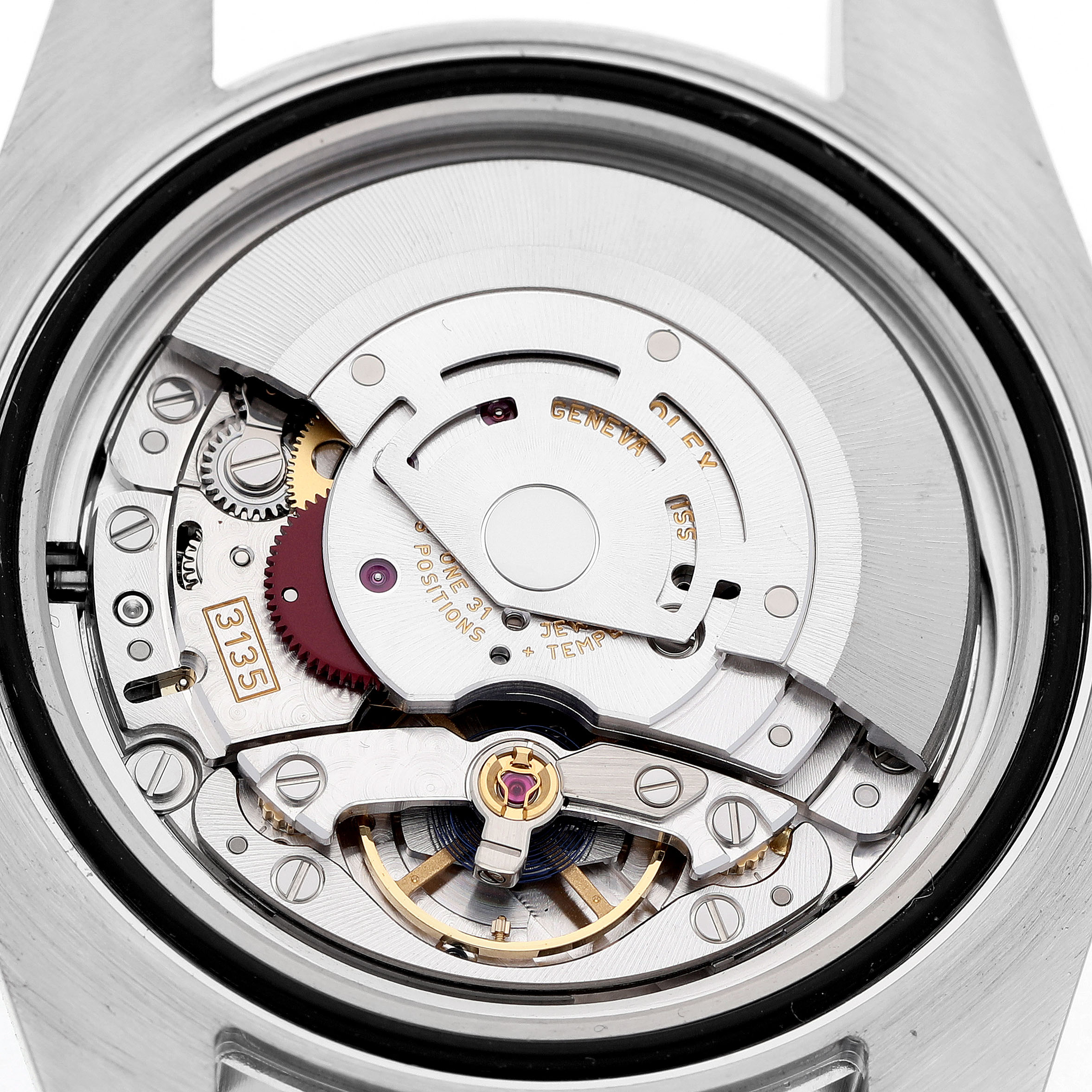 The image shows the back view of a Rolex Submariner 116610LV Men's Stainless Steel Green Dial, focusing on its intricate movement and rotor.