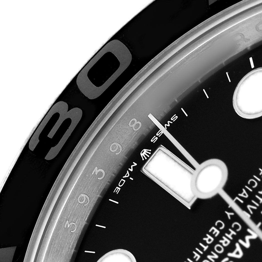 The image shows a close-up of the Rolex Yacht-Master 226627 Men's Titanium Black Dial's bezel, dial, and part of a hand.