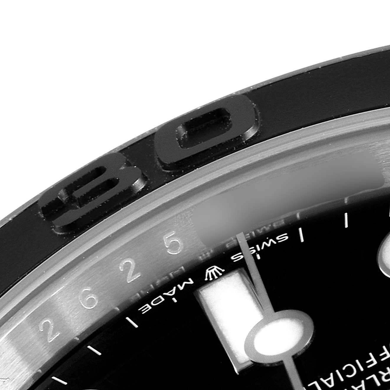Close-up angled view of the bezel and upper part of the dial on a Rolex Yacht-Master 226659 Men's Stainless Steel Black Dial 226659 Men's Stainless Steel Black Dial watch.
