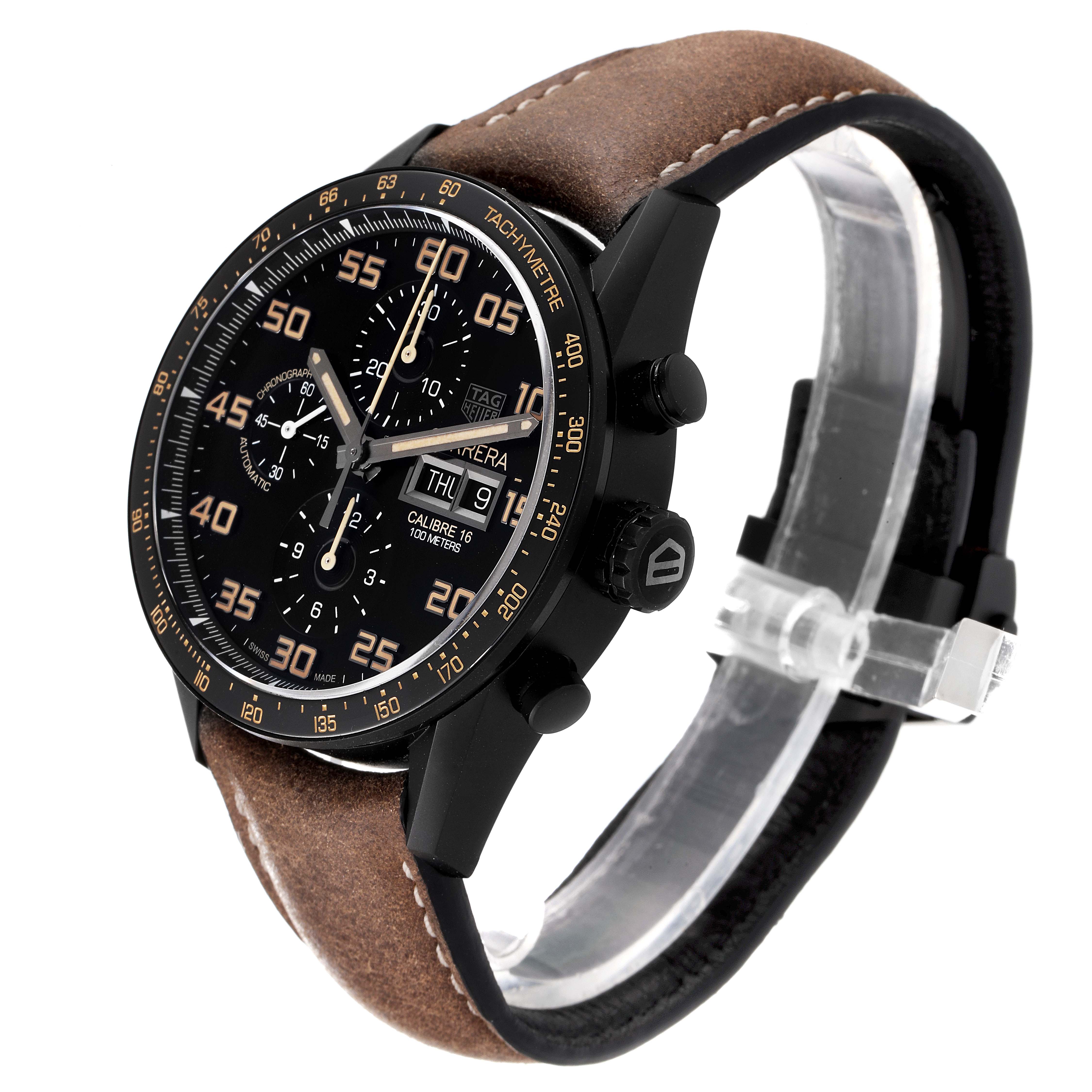 The image shows a side angle of the Tag Heuer Carrera CV2A84.FC6394 Men
s Titanium Black Dial CV2A84.FC6394 Men
s Titanium Black Dial watch, highlighting the face, crown, pushers, and brown leather strap.