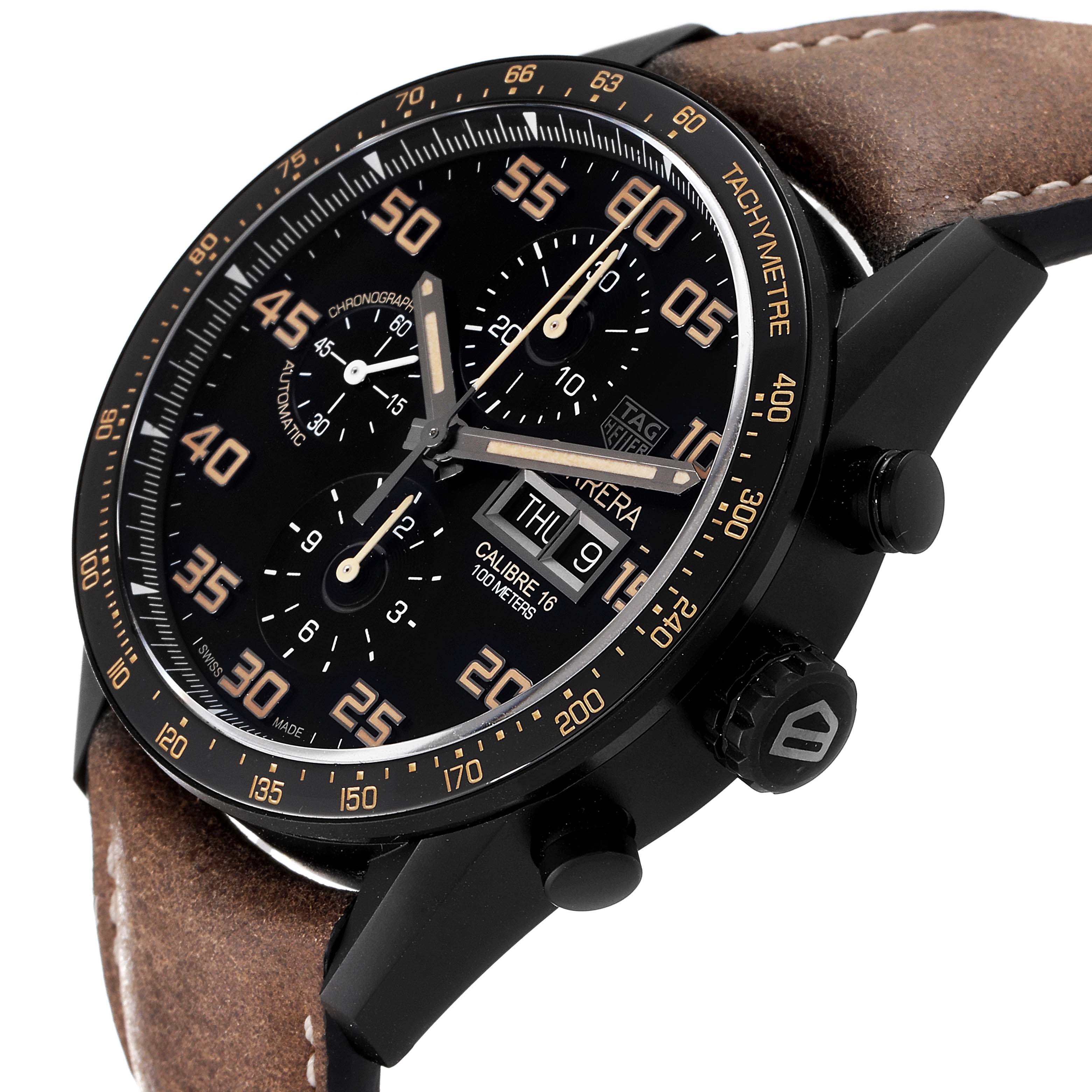 The image shows a close-up side angle of a Tag Heuer Carrera CV2A84.FC6394 Men
s Titanium Black Dial CV2A84.FC6394 Men
s Titanium Black Dial watch, displaying the bezel, dial, subdials, crown, and part of the leather strap.