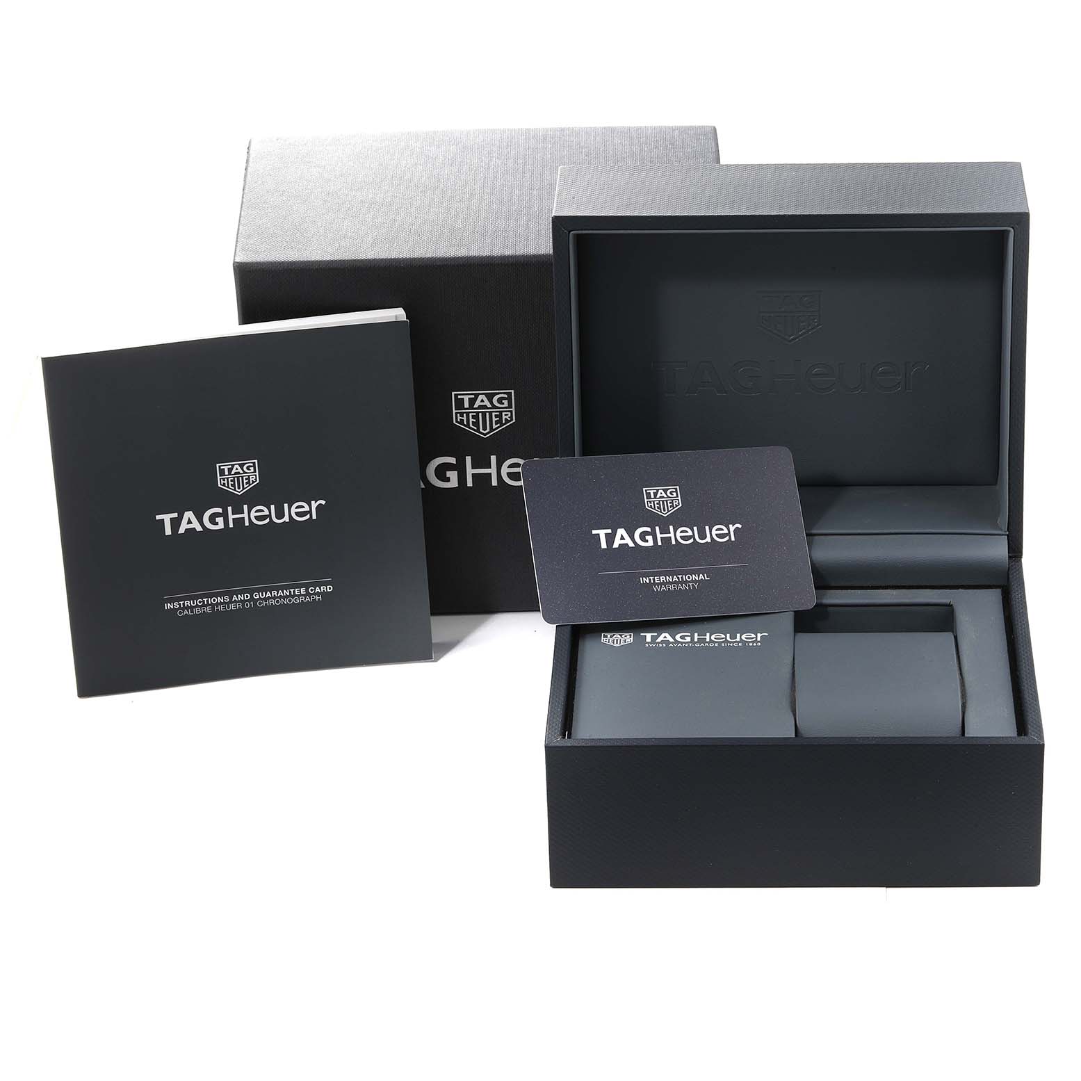 The image shows the packaging, instruction manual, and warranty card for the Tag Heuer Limited Edition CAR2A1J.FC6400 Men's Stainless Steel Black Dial CAR2A1J.FC6400 Men's Stainless Steel Black Dial watch.
