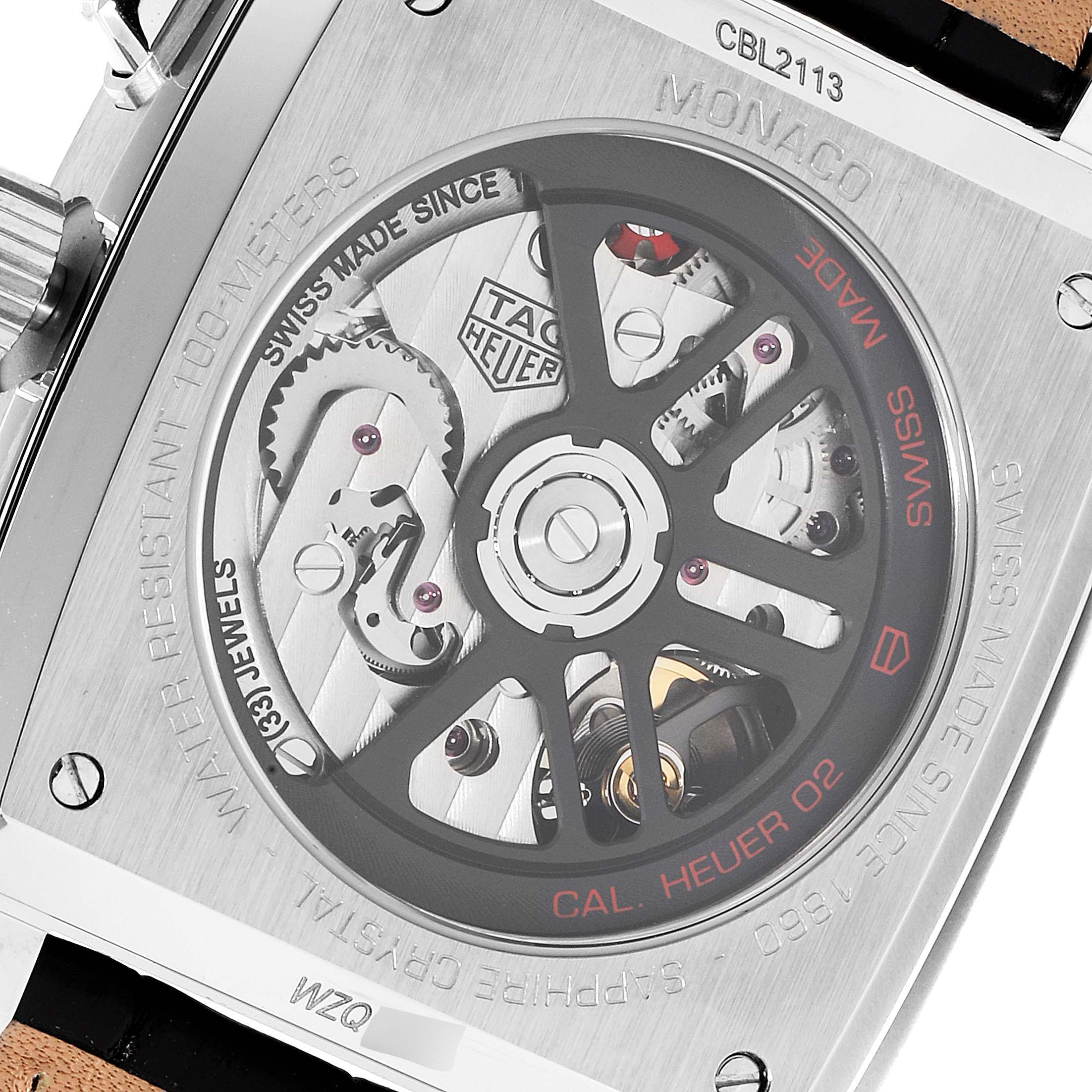 This image shows the back of a Tag Heuer Monaco CBL2113 Men's Stainless Steel Black Dial CBL2113 Men's Stainless Steel Black Dial watch, showcasing intricate internal mechanics and movement details.