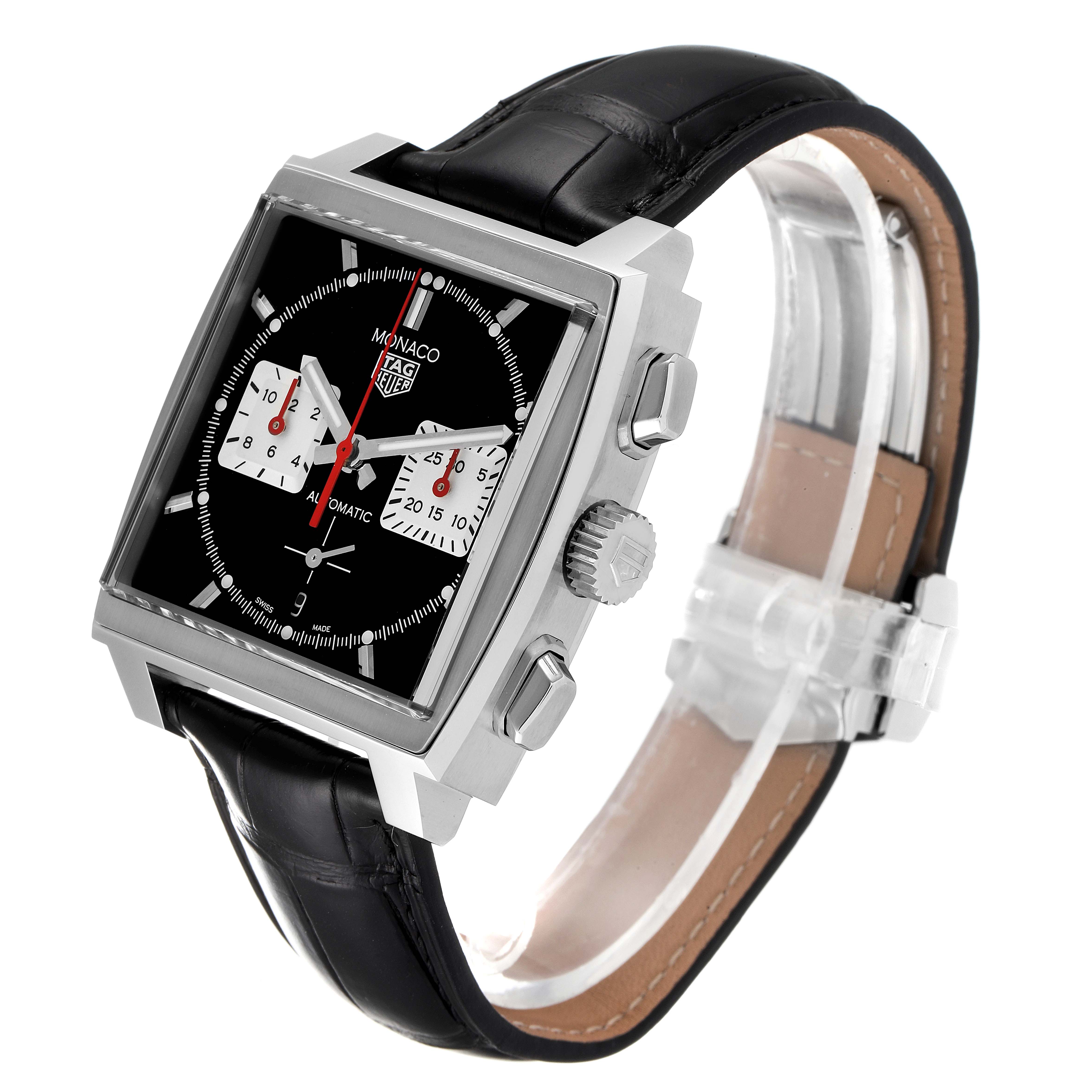 The Tag Heuer Monaco CBL2113 Men's Stainless Steel Black Dial CBL2113 Men's Stainless Steel Black Dial watch is shown at a three-quarter angle, highlighting its square face, dials, crown, and black leather strap.