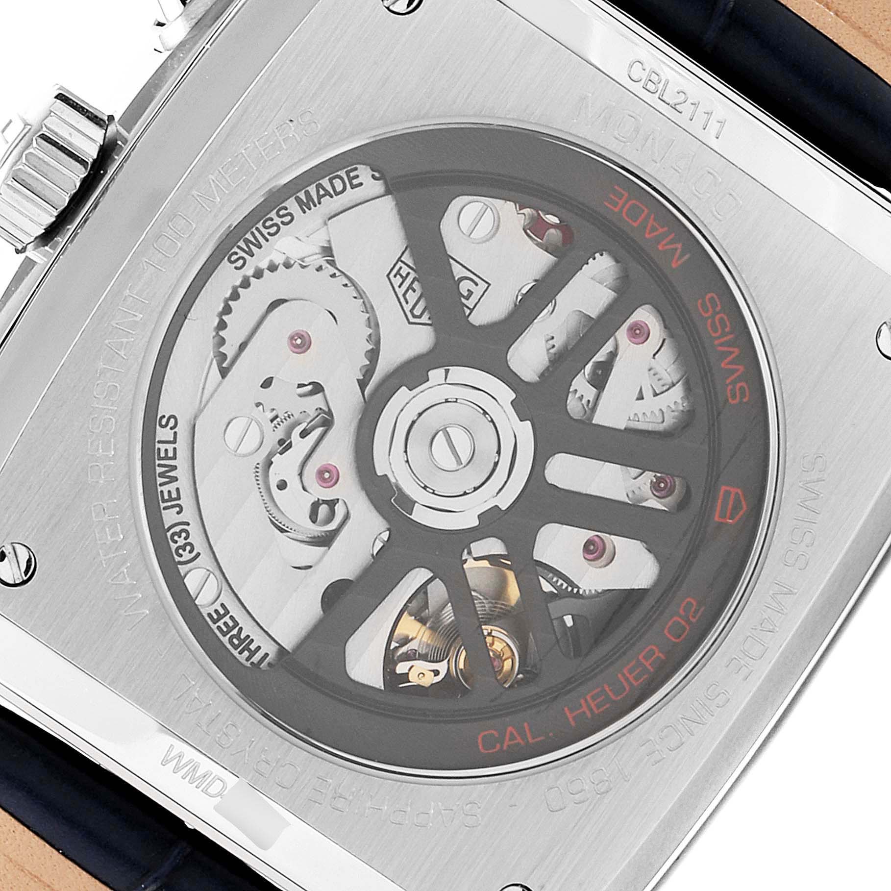 This image shows the back of the Tag Heuer Monaco CBL2111.FC6453 Men's Stainless Steel Blue Dial CBL2111.FC6453 Men's Stainless Steel Blue Dial watch, highlighting the exposed automatic movement and rotor.
