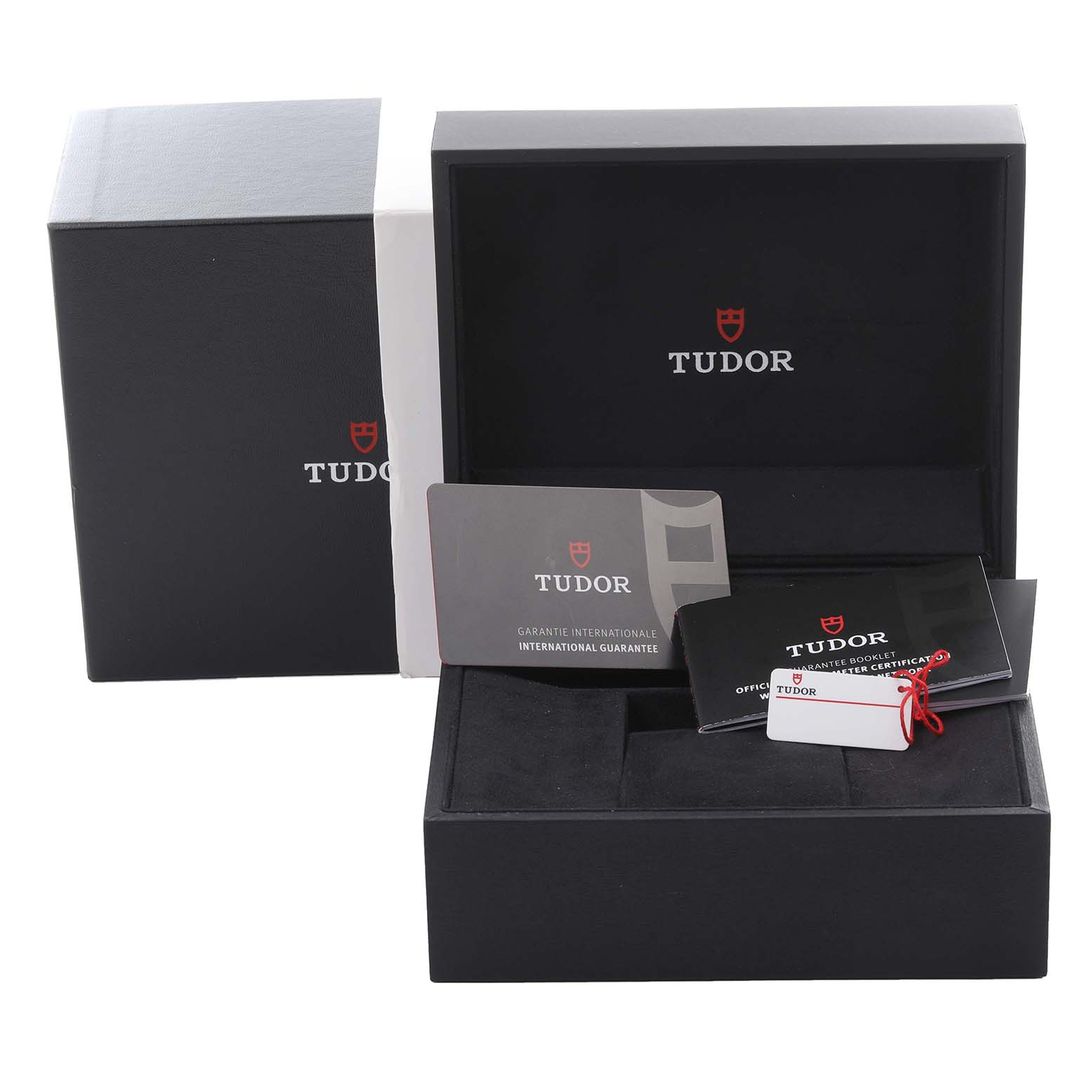 The image shows a Tudor Heritage Black Bay 79360 Men's Stainless Steel White Dial 79360 Men's Stainless Steel White Dial watch box, warranty card, and manuals from a front angle.
