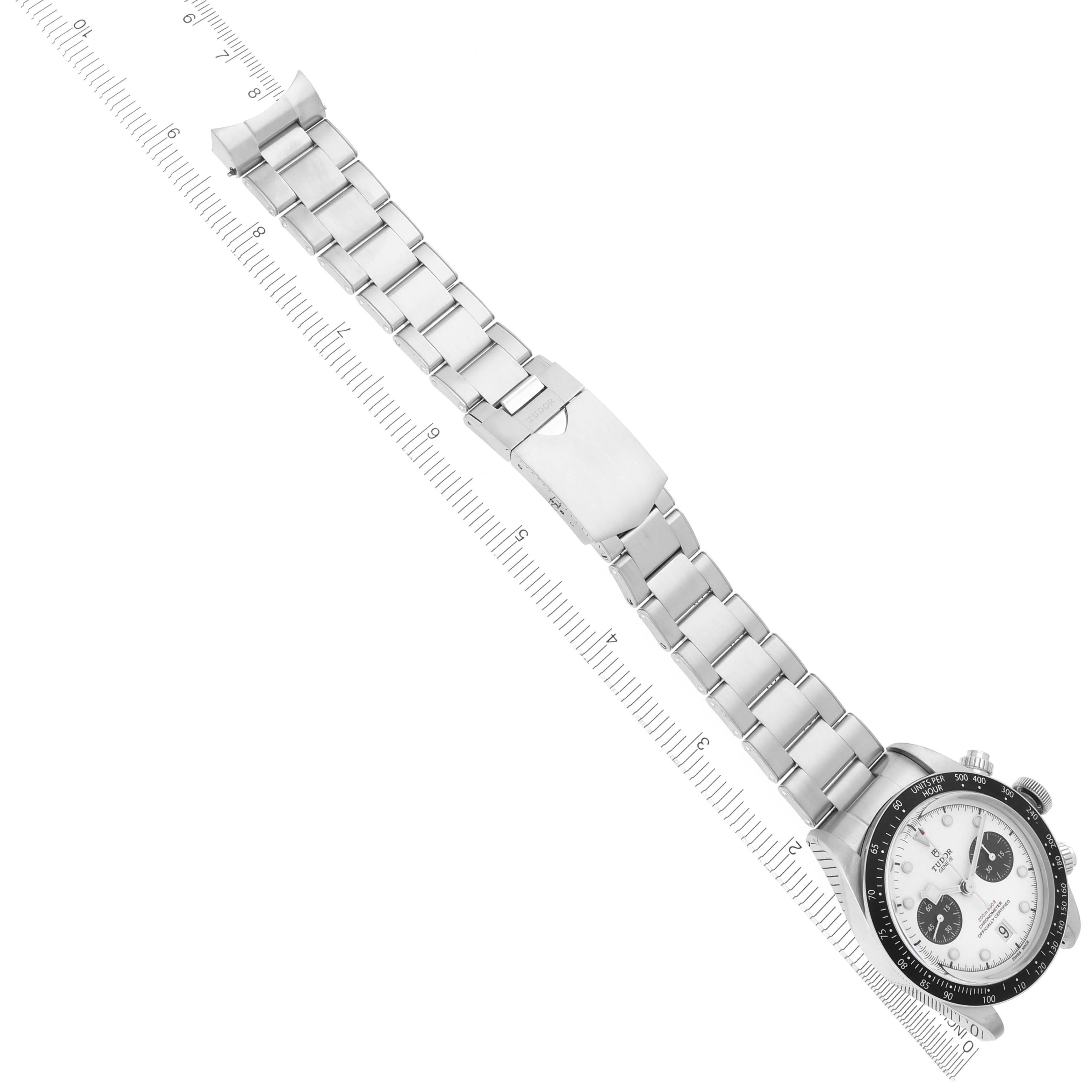 The Tudor Heritage Black Bay 79360 Men's Stainless Steel White Dial 79360 Men's Stainless Steel White Dial watch is shown from a top view, highlighting the full bracelet and face.