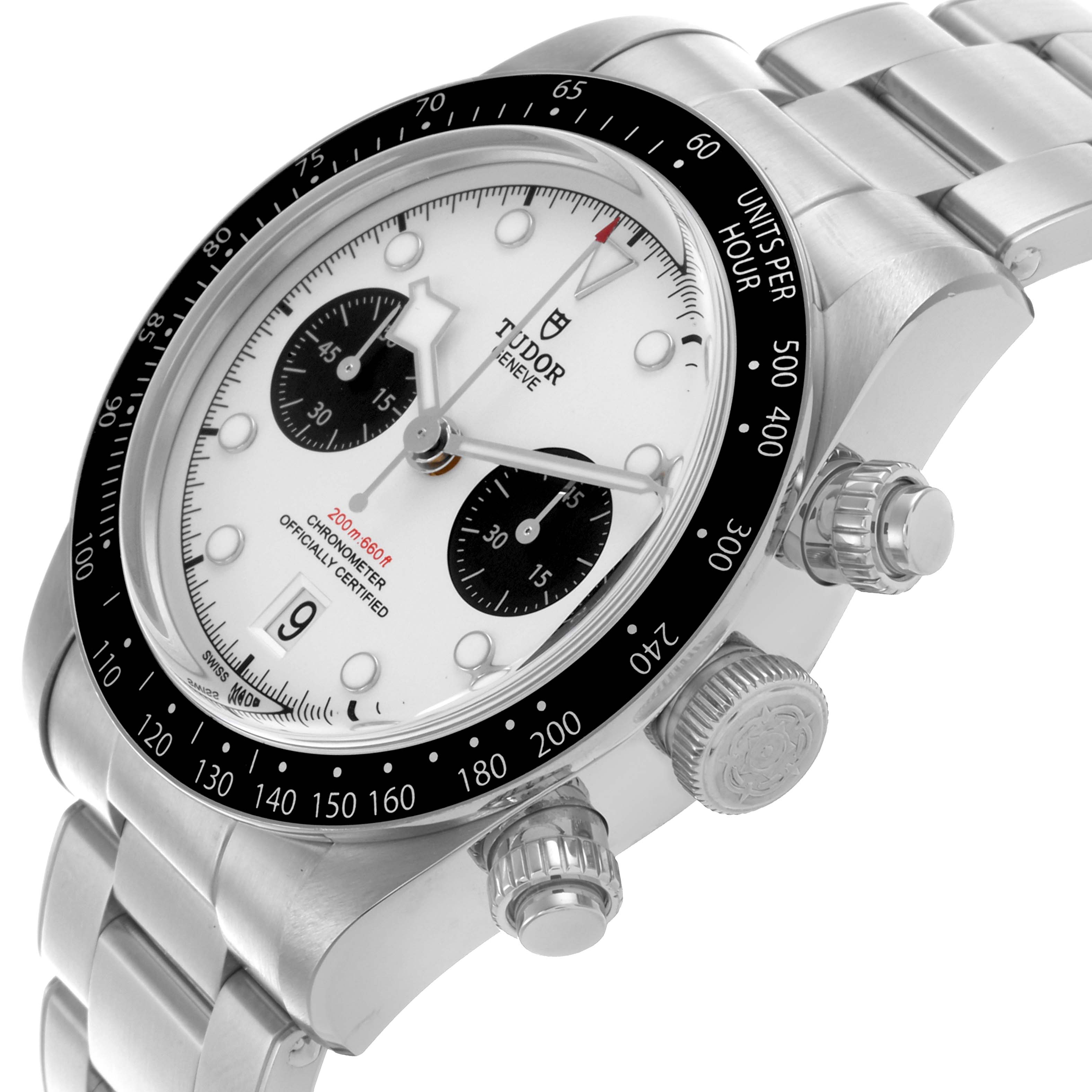 The Tudor Heritage Black Bay 79360 Men's Stainless Steel White Dial 79360 Men's Stainless Steel White Dial watch is shown at a side angle, highlighting the crown, bezel, pushers, and bracelet.