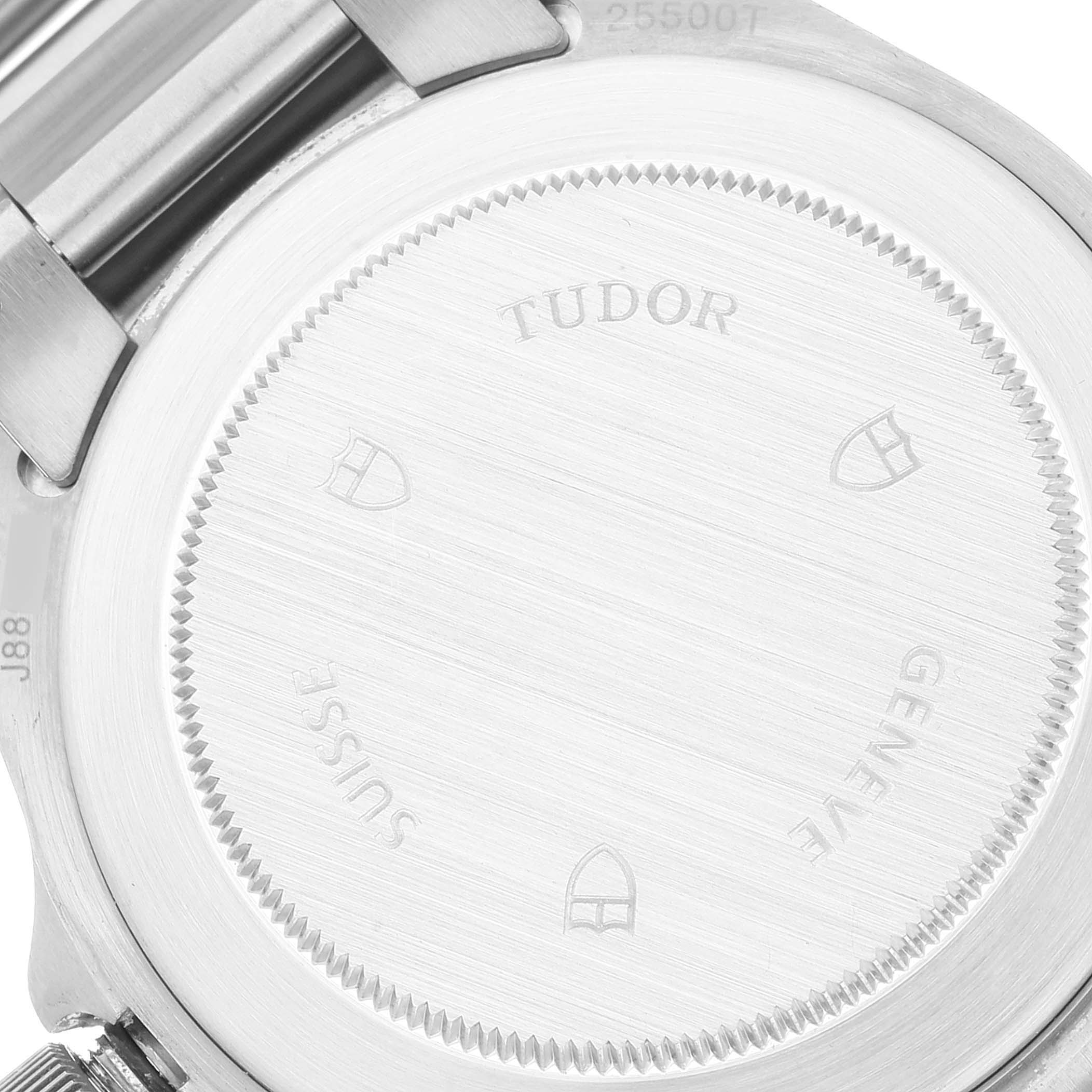 The image shows the case back of a Tudor Pelagos 25500TN Men's Titanium Black Dial 25500TN Men's Titanium Black Dial watch, showcasing the brand and model engravings.