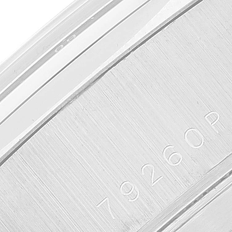 This image shows a close-up angle of a Prince model by Tudor, highlighting the engraved serial number "79260P" on the metal case.