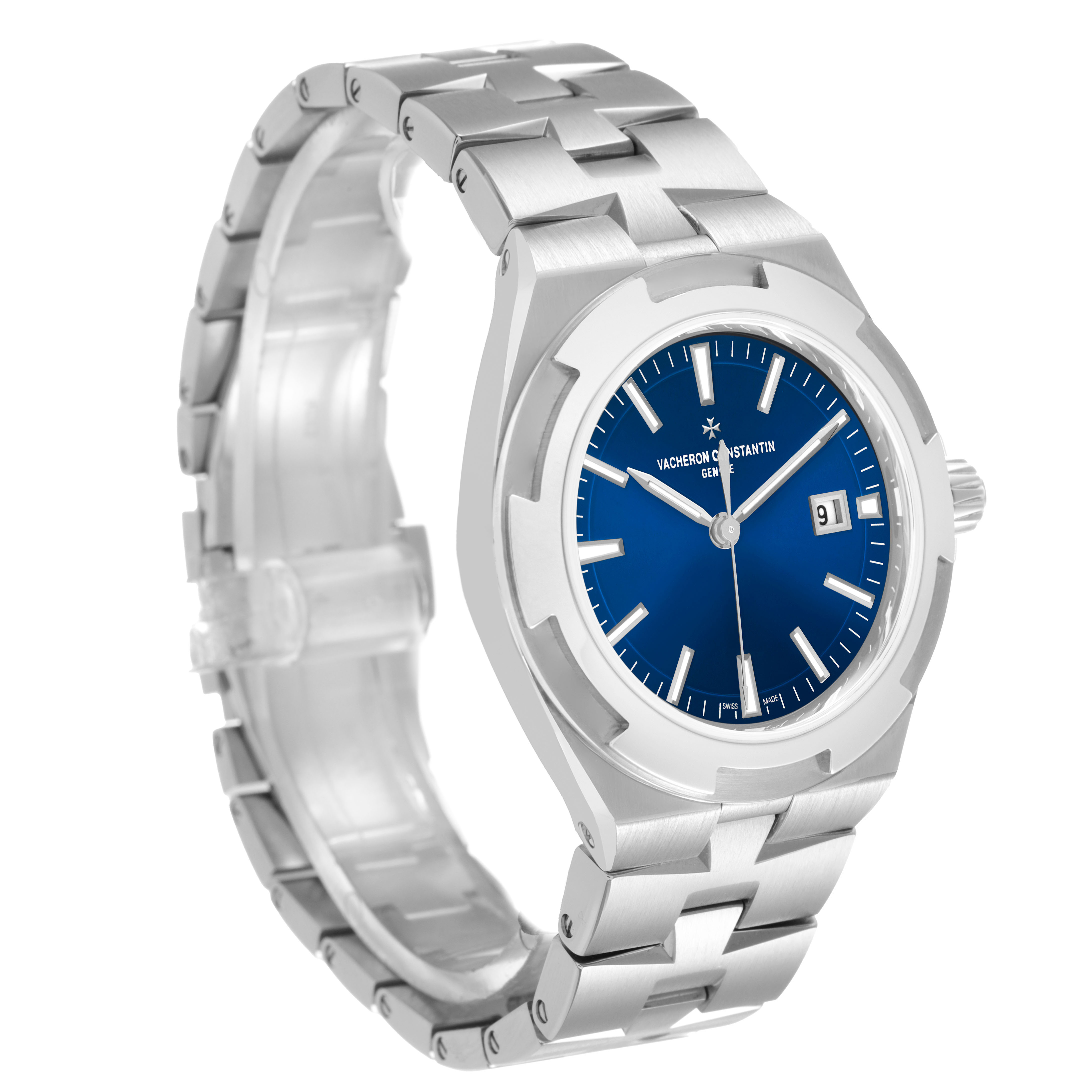 The Vacheron Constantin Overseas 4600V/200A-B980 Men's Stainless Steel Blue Dial watch is shown at a three-quarter angle, highlighting its blue dial, date window, and metal bracelet.