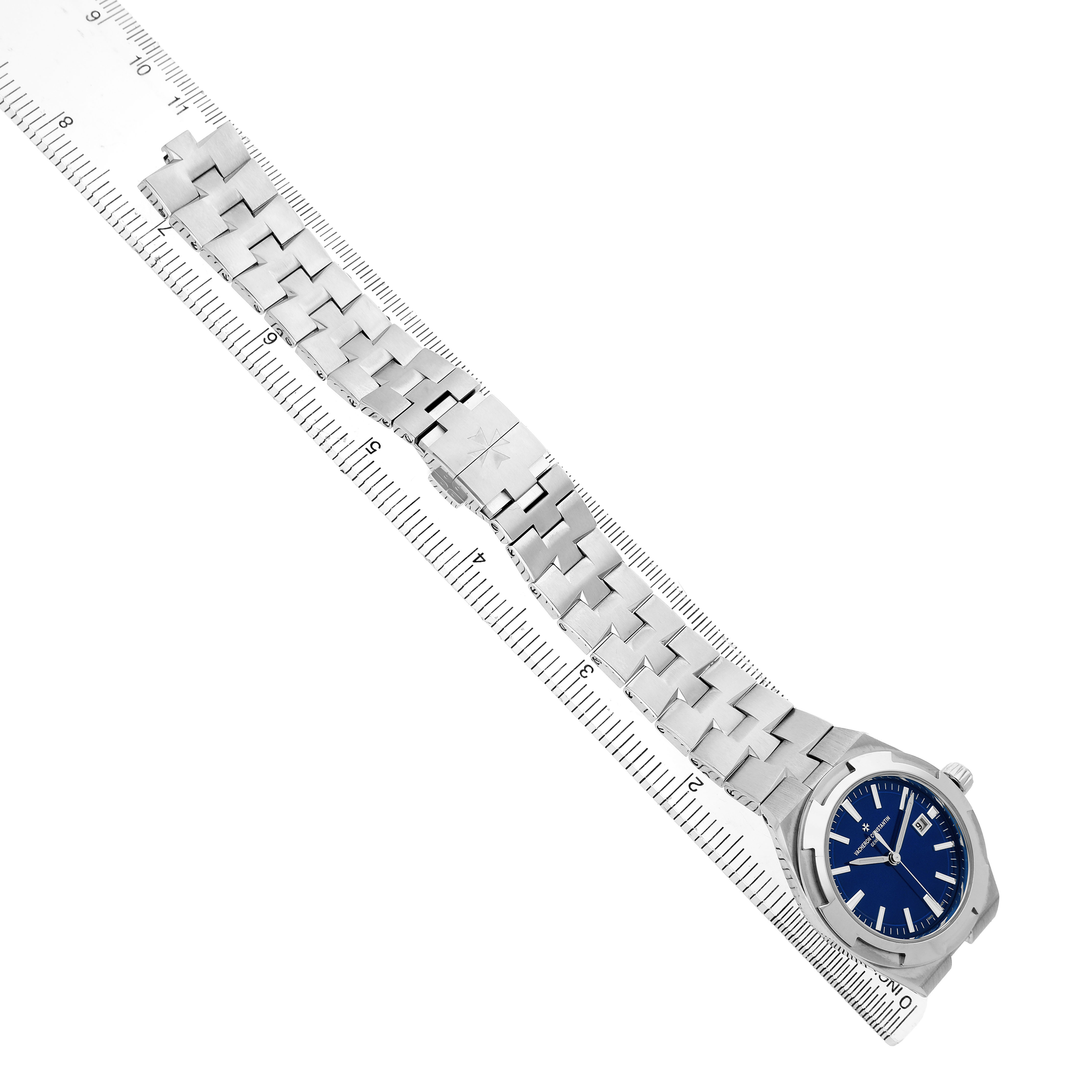 The Vacheron Constantin Overseas 4600V/200A-B980 Men's Stainless Steel Blue Dial watch is shown from an angled top view, highlighting the bracelet and blue dial.