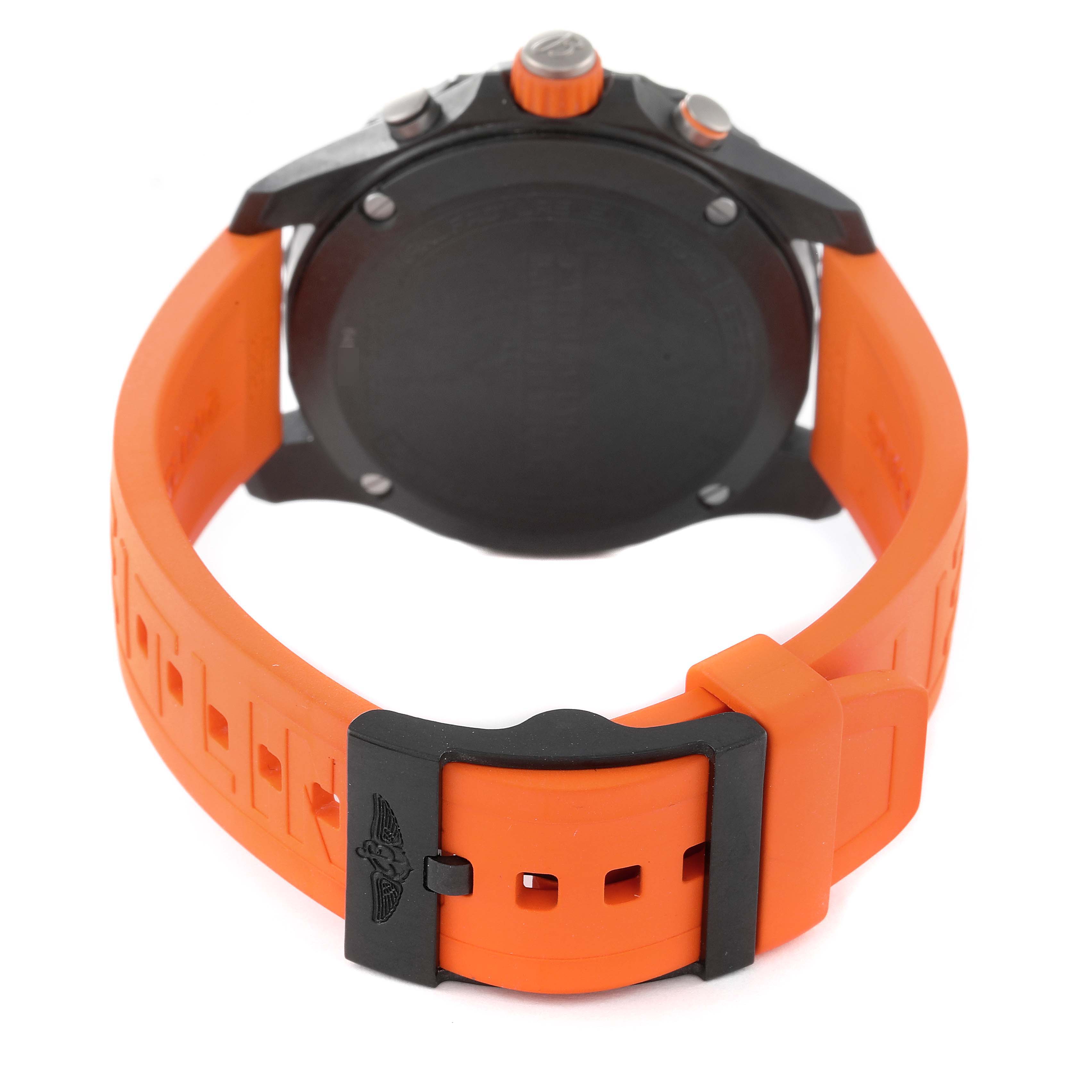 The image shows the back view of a Breitling Professional Series X82310 Men's Titanium Black Dial X82310 Men's Titanium Black Dial watch, focusing on its case back and orange strap with buckle.