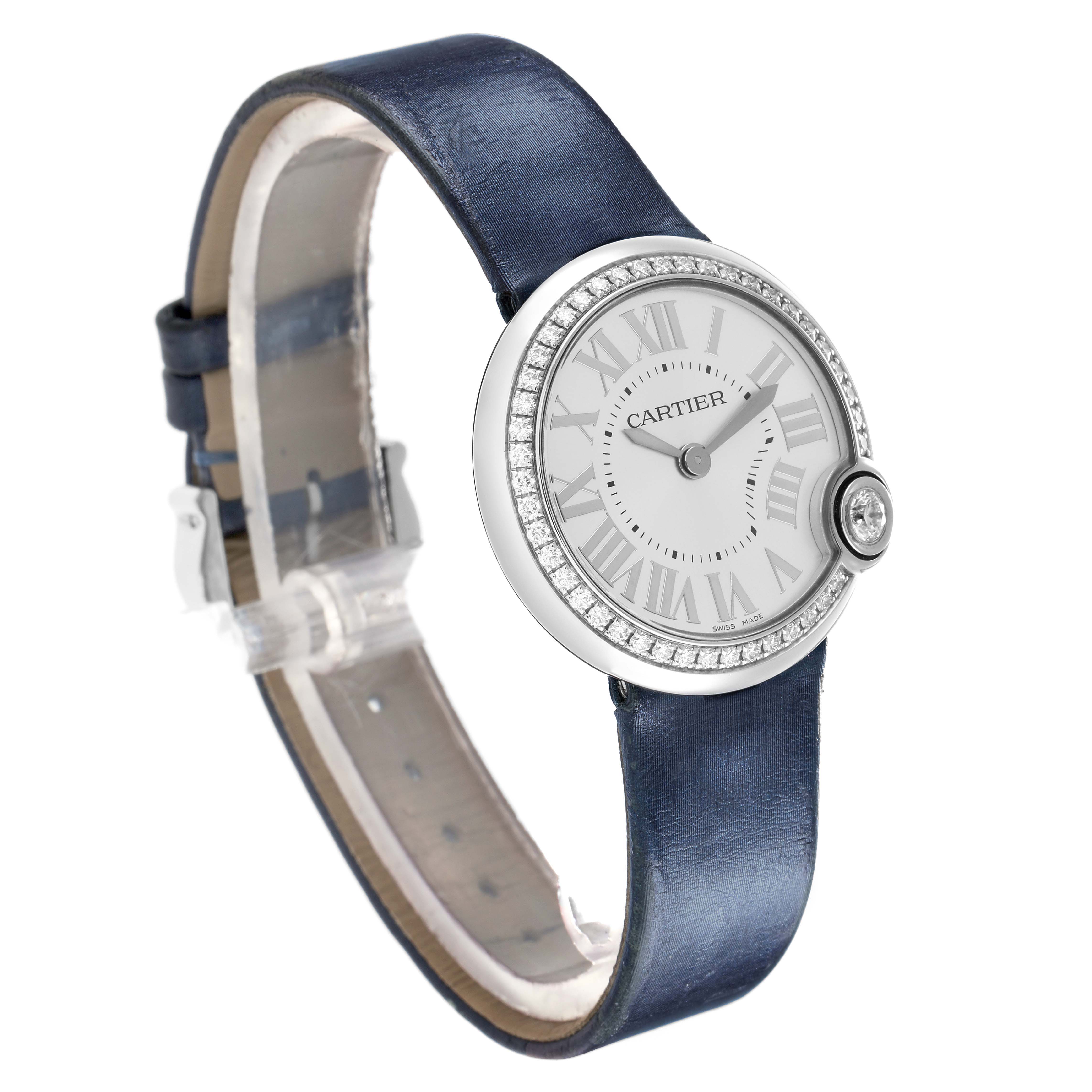 The Cartier Ballon Blanc W4BL0003 Women
s Stainless Steel Silver Dial watch is shown at a slight angle, highlighting the face, diamond bezel, and blue strap.