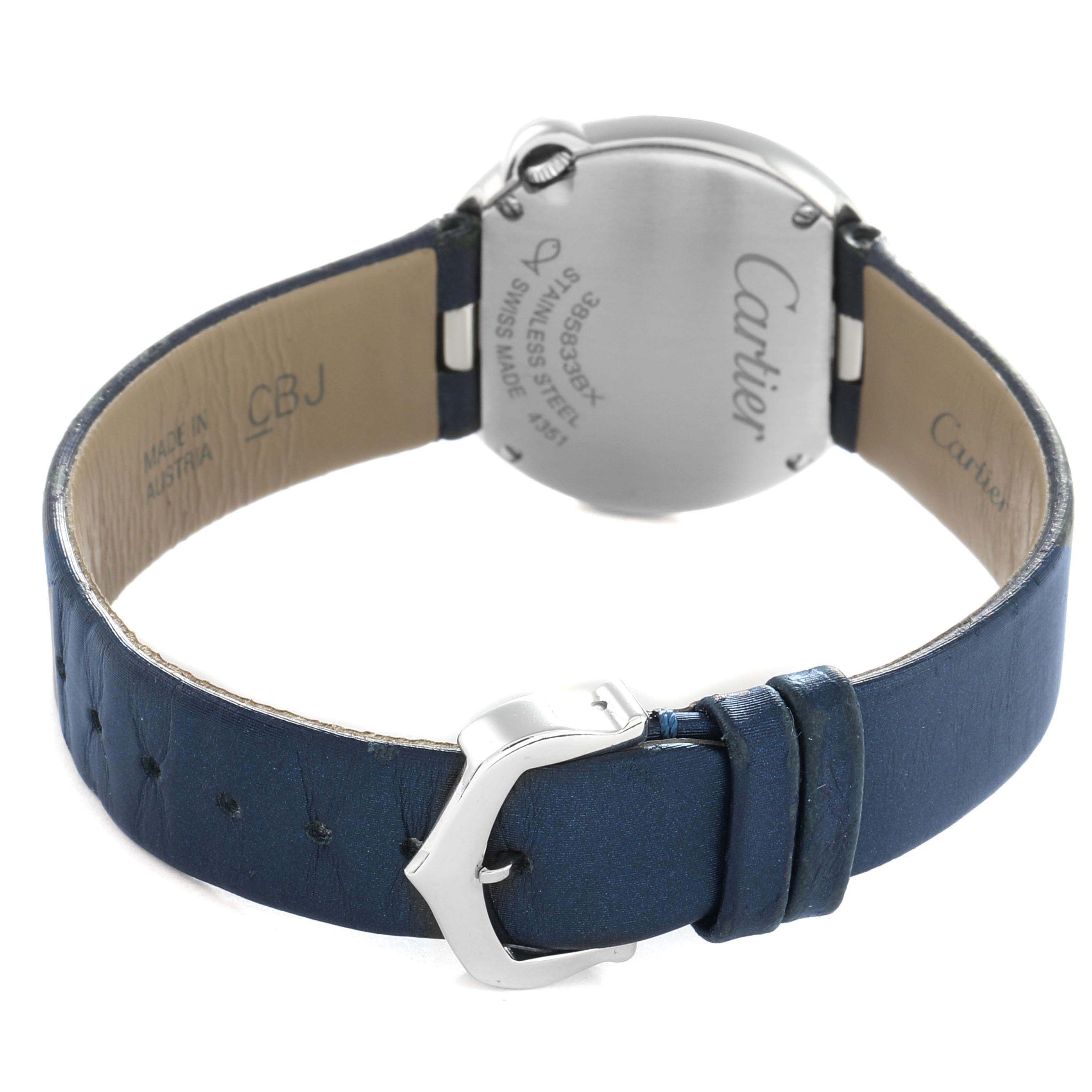 The image shows the back of a Cartier Ballon Blanc W4BL0003 Women
s Stainless Steel Silver Dial watch, highlighting the case back, blue leather strap, and buckle.