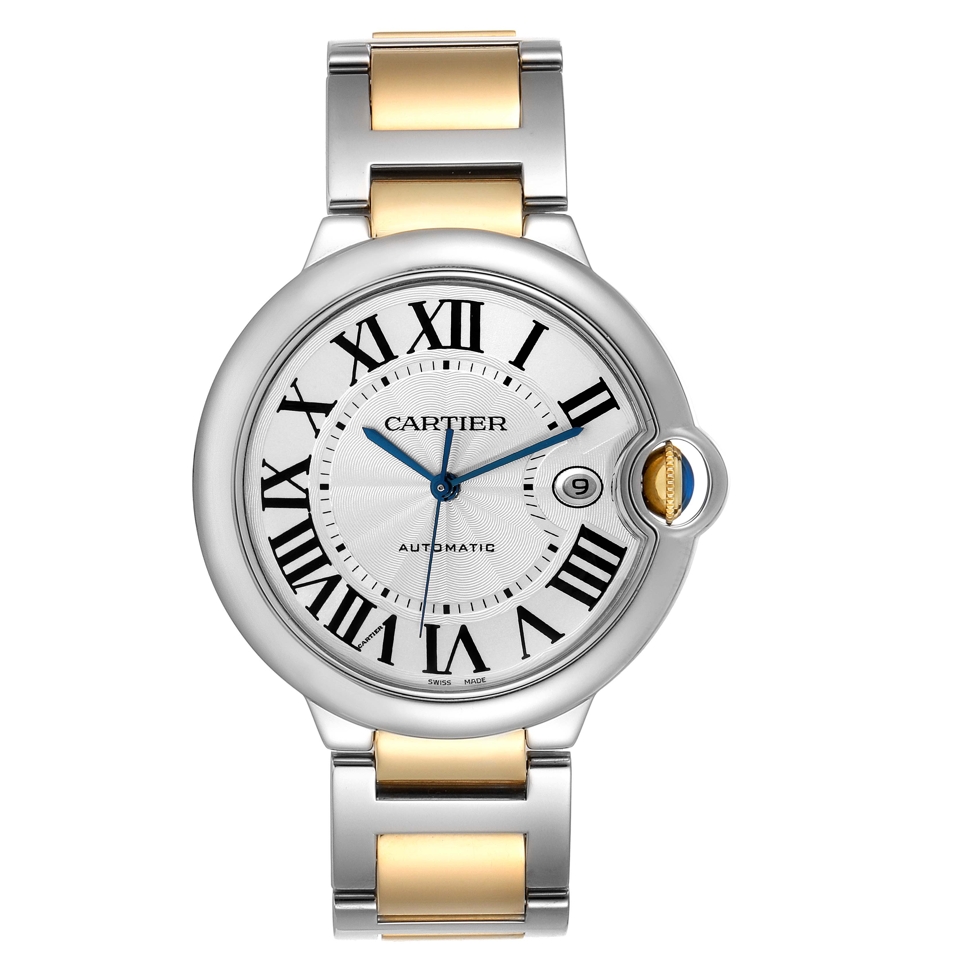 The image shows a frontal view of a Ballon Bleu by Cartier, with its silver dial, Roman numerals, blue hands, and date window.
