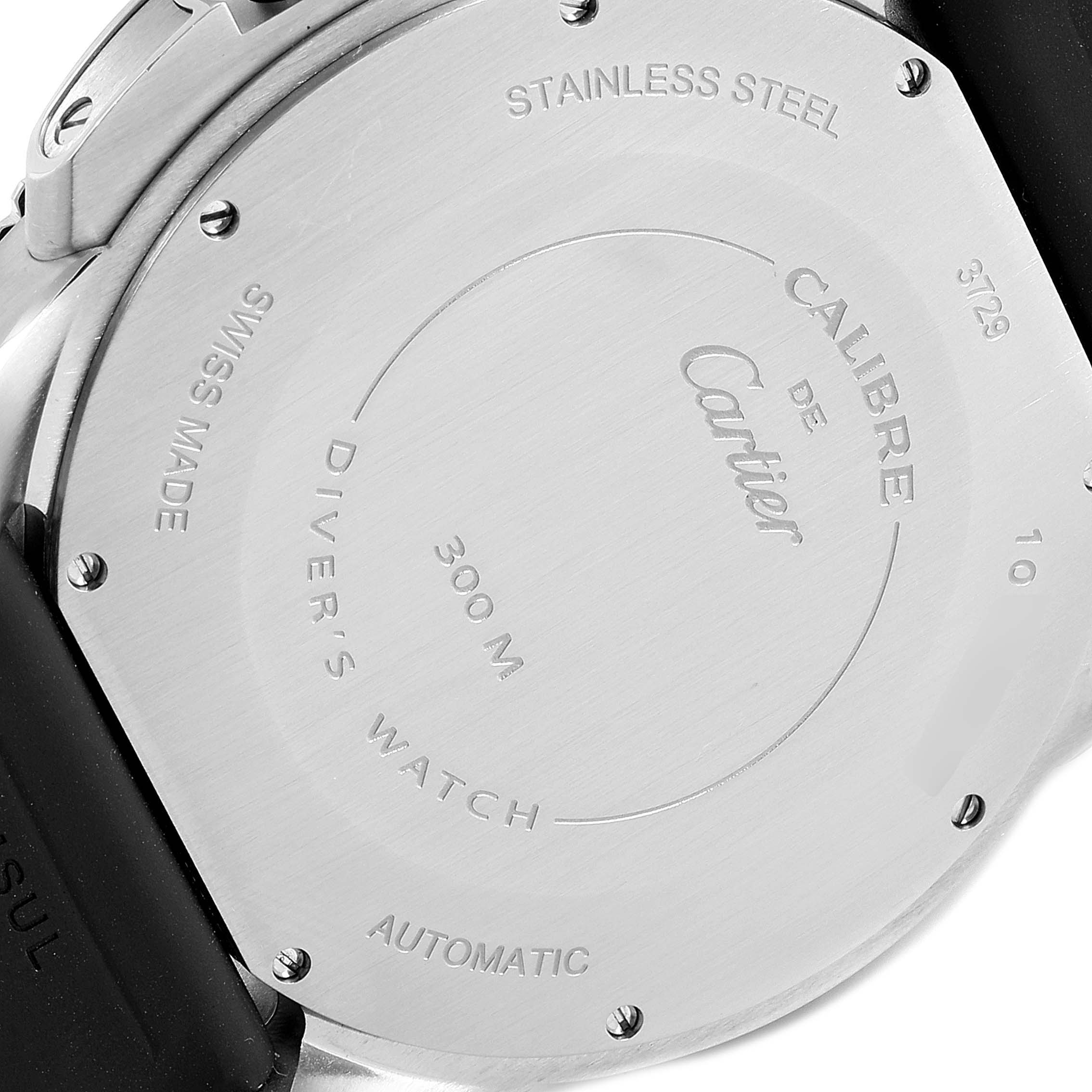 The image shows the back case of a Calibre de Cartier watch by Cartier, highlighting its stainless steel material and water resistance.