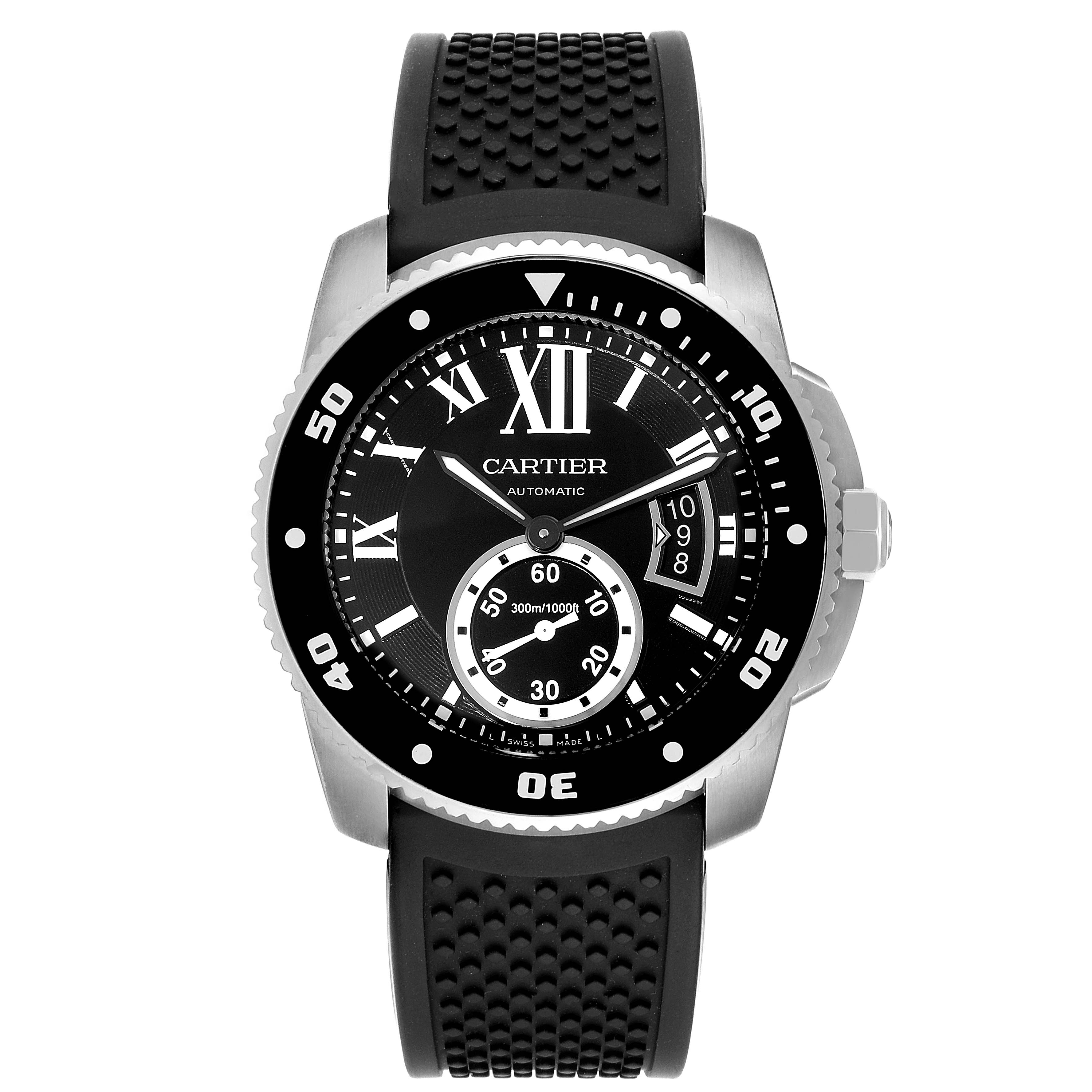 The image shows a front view of a Calibre de Cartier watch by Cartier with a black dial and rubber strap.