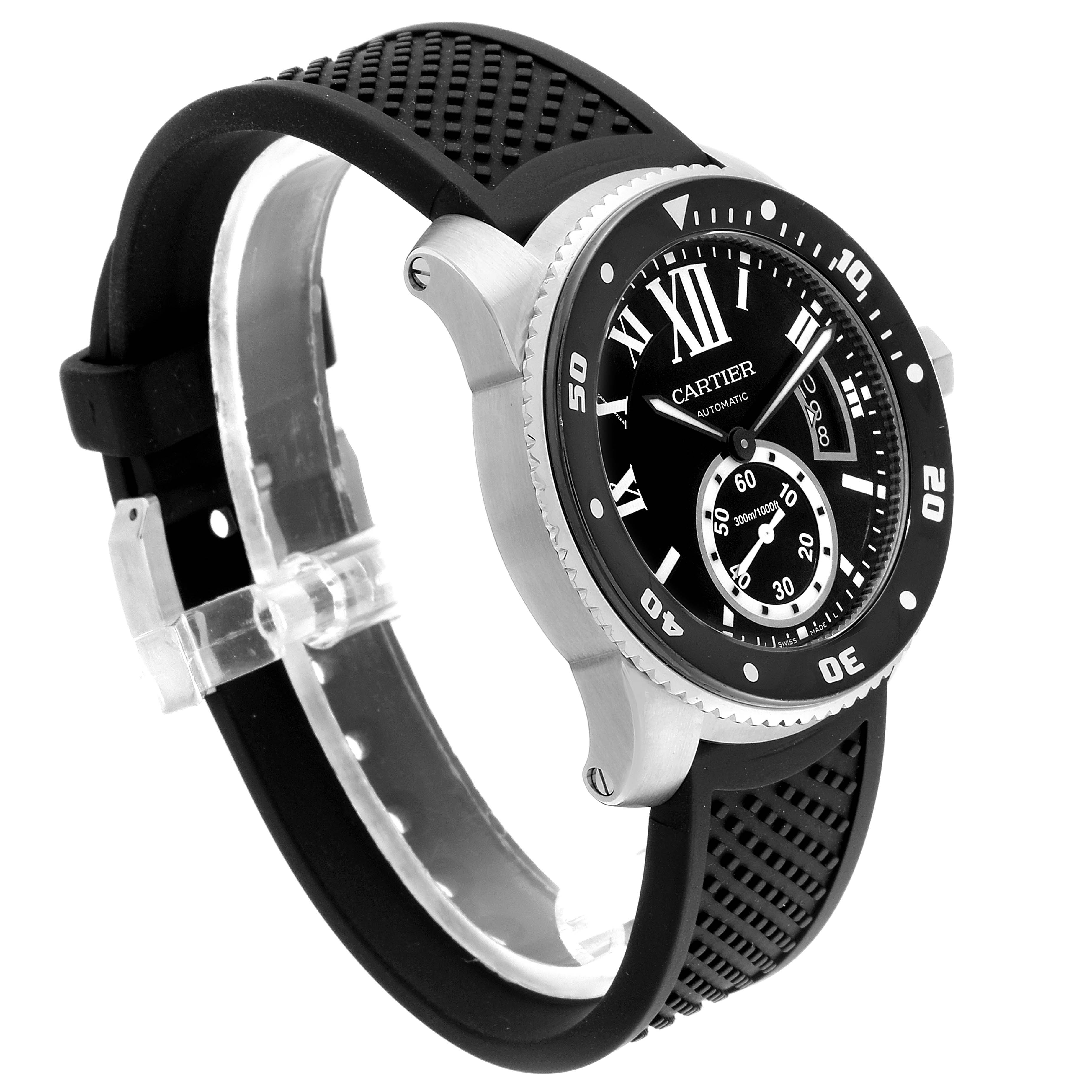 The watch is a Calibre de Cartier by Cartier, shown at a side angle highlighting the face, bezel, and rubber strap.