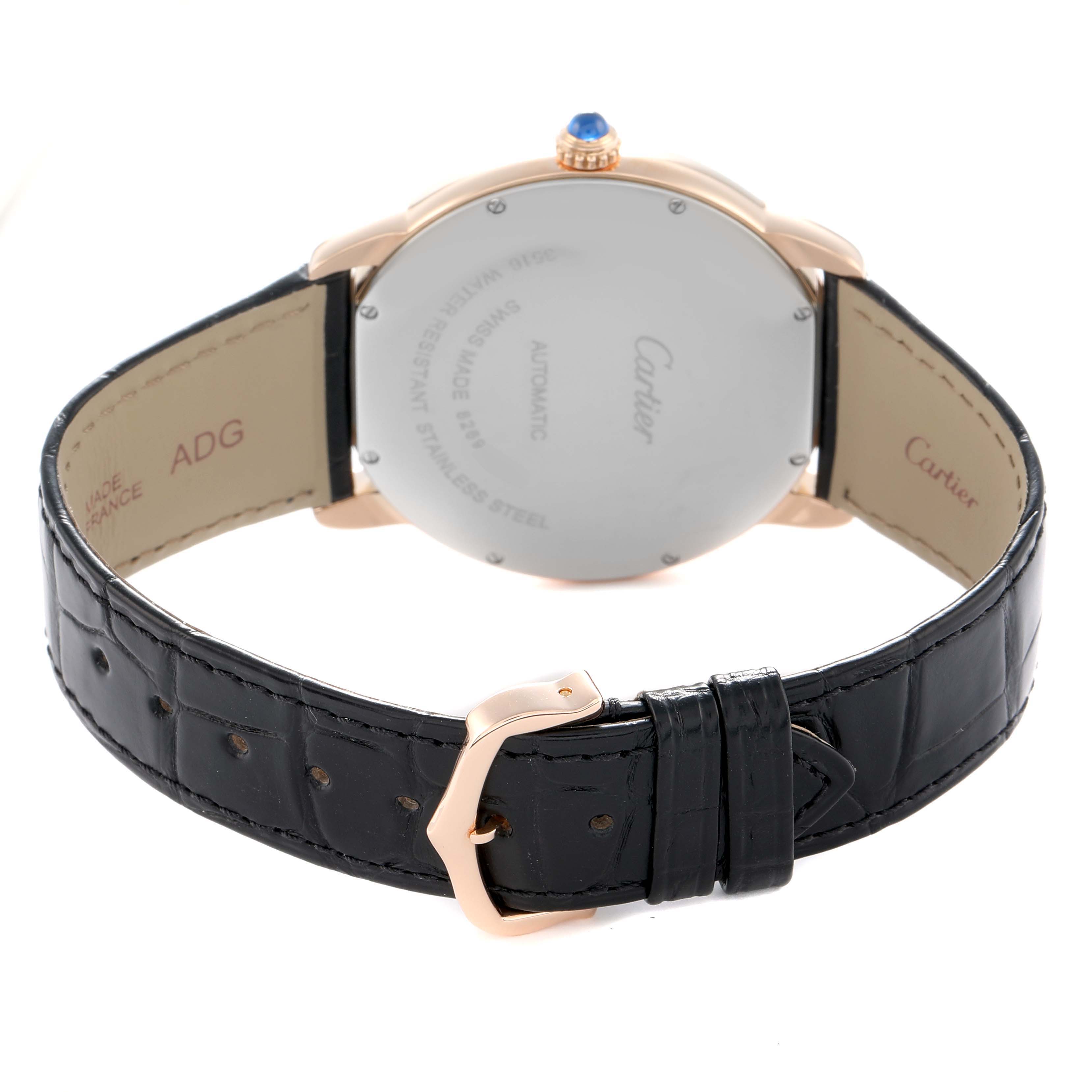 The Cartier Ronde W6701009 Men
s Steel and Gold (two tone) Silver Dial watch is shown from the back, highlighting the case back, strap, and buckle.