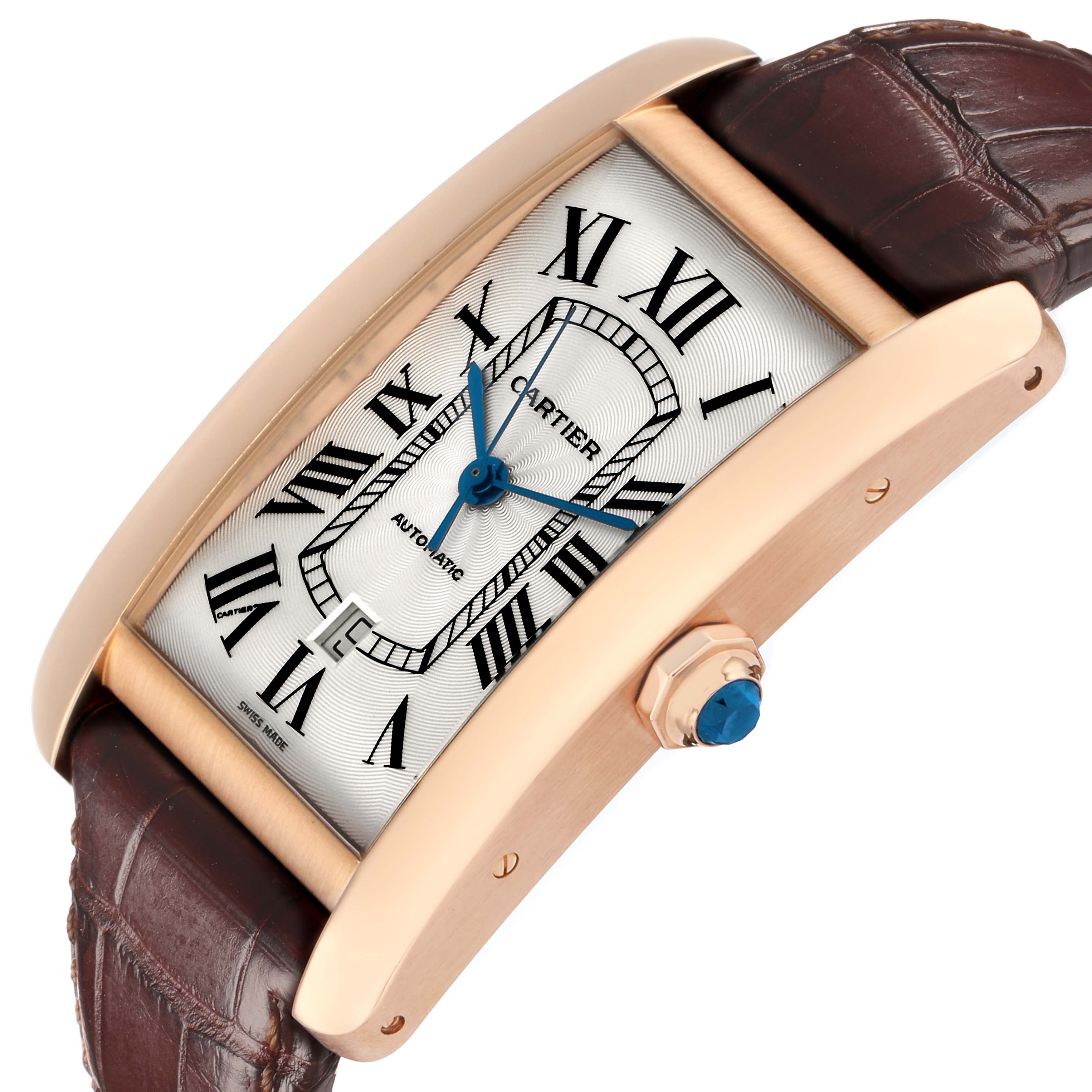 The Cartier Tank Americaine W2609856 Men
s Rose Gold Silver Dial watch is shown at an angled side view, highlighting the case, crown, and part of the leather strap.