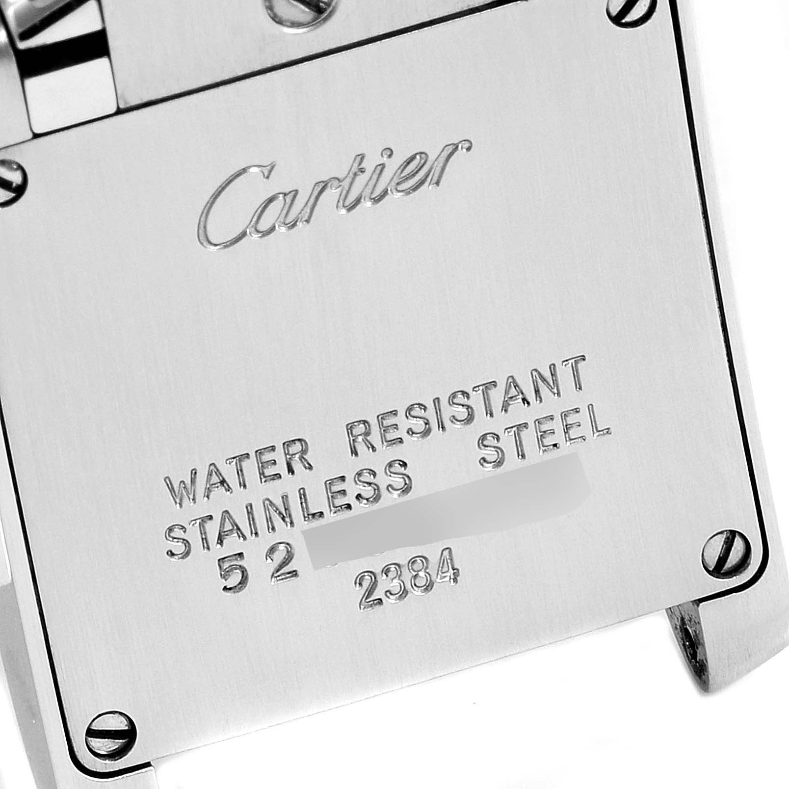 The image shows the back case of a Cartier Tank Française watch, highlighting the brand and material details.