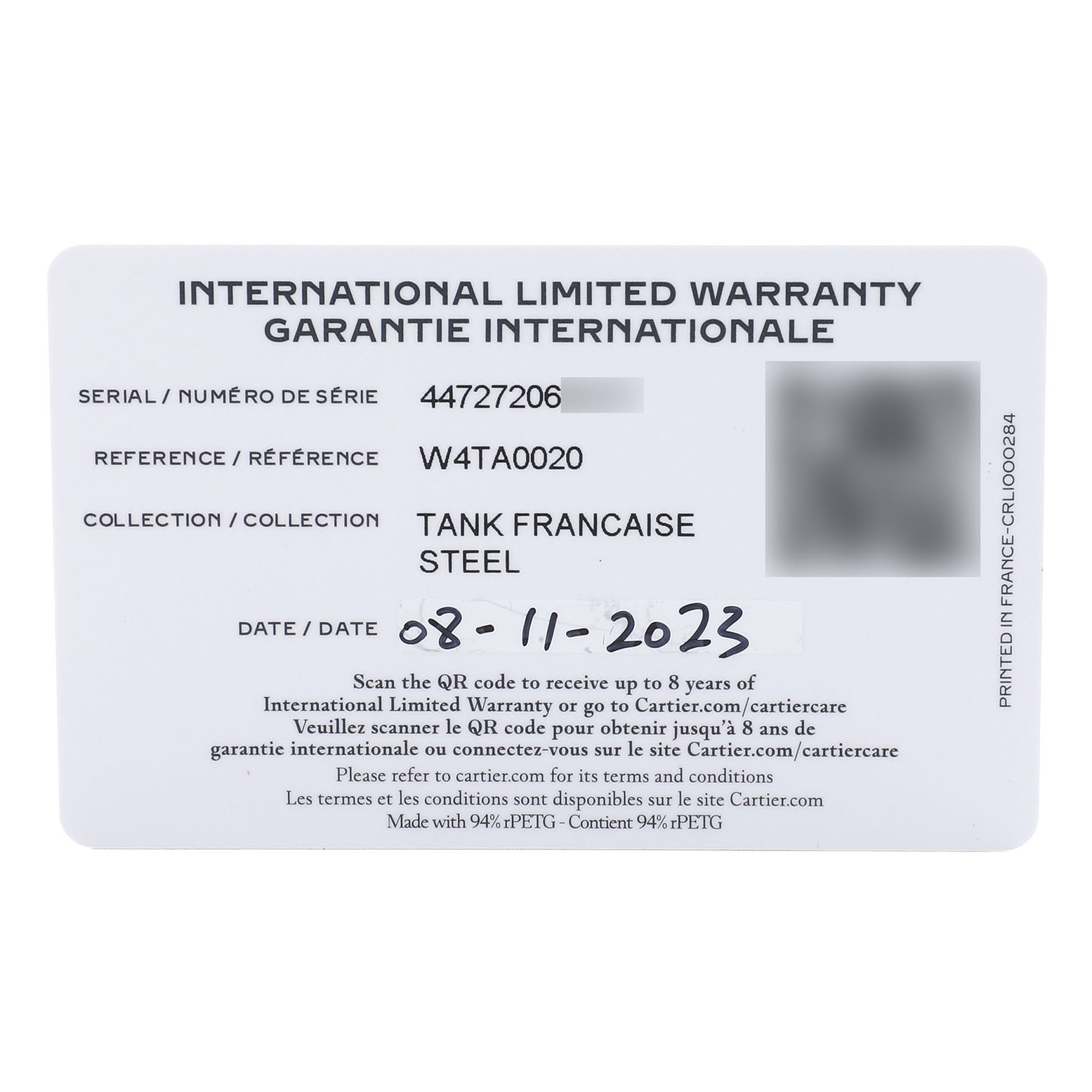 The image shows an International Limited Warranty card for a Cartier Tank Francaise W4TA0020 Women's Stainless Steel Silver Dial model, detailing the serial number, reference, and date.