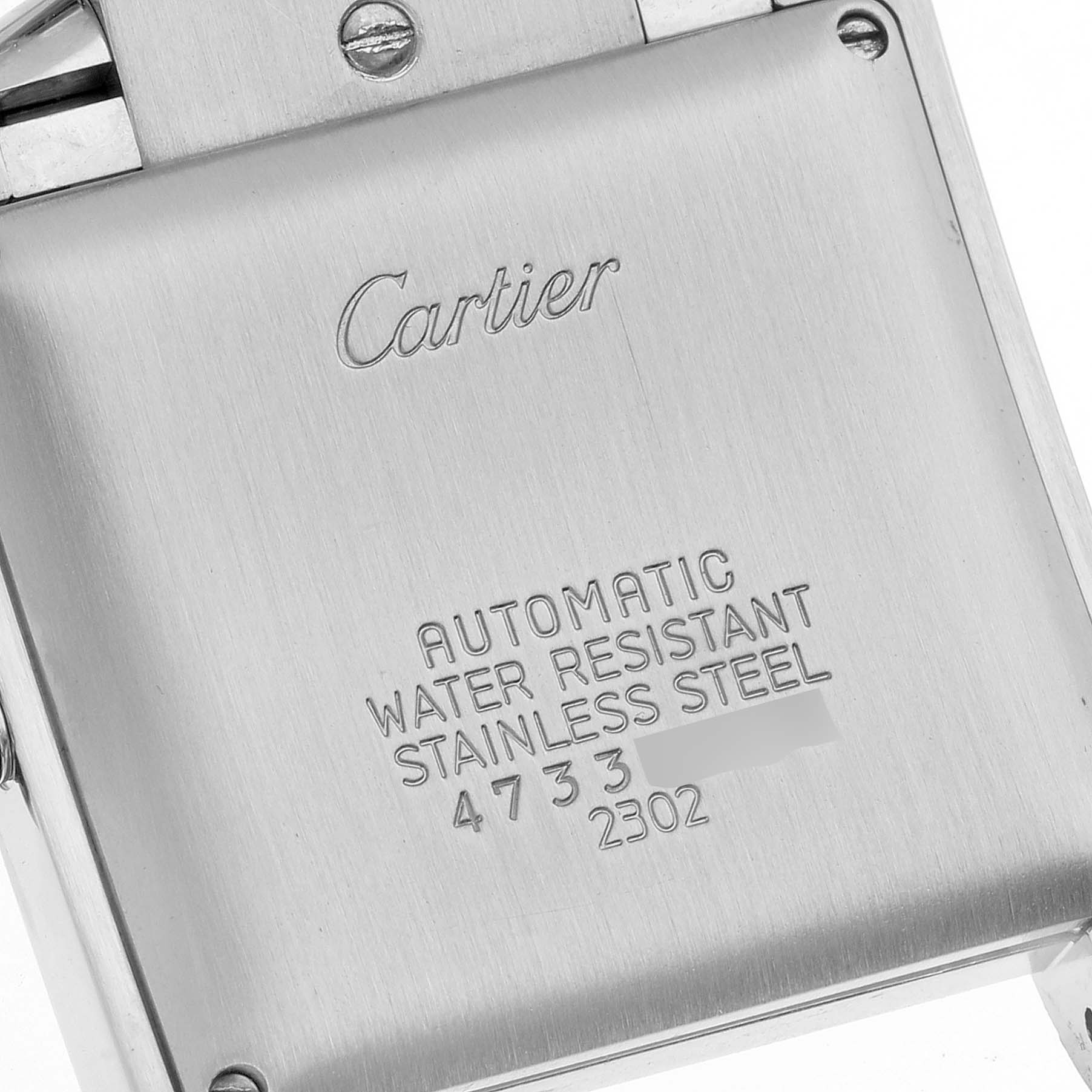 This image shows the back case of a Cartier Tank Francaise W51005Q4 Men
s Steel and Gold (two tone) Silver Dial W51005Q4 Men
s Steel and Gold (two tone) Silver Dial watch, highlighting details such as water resistance and material.