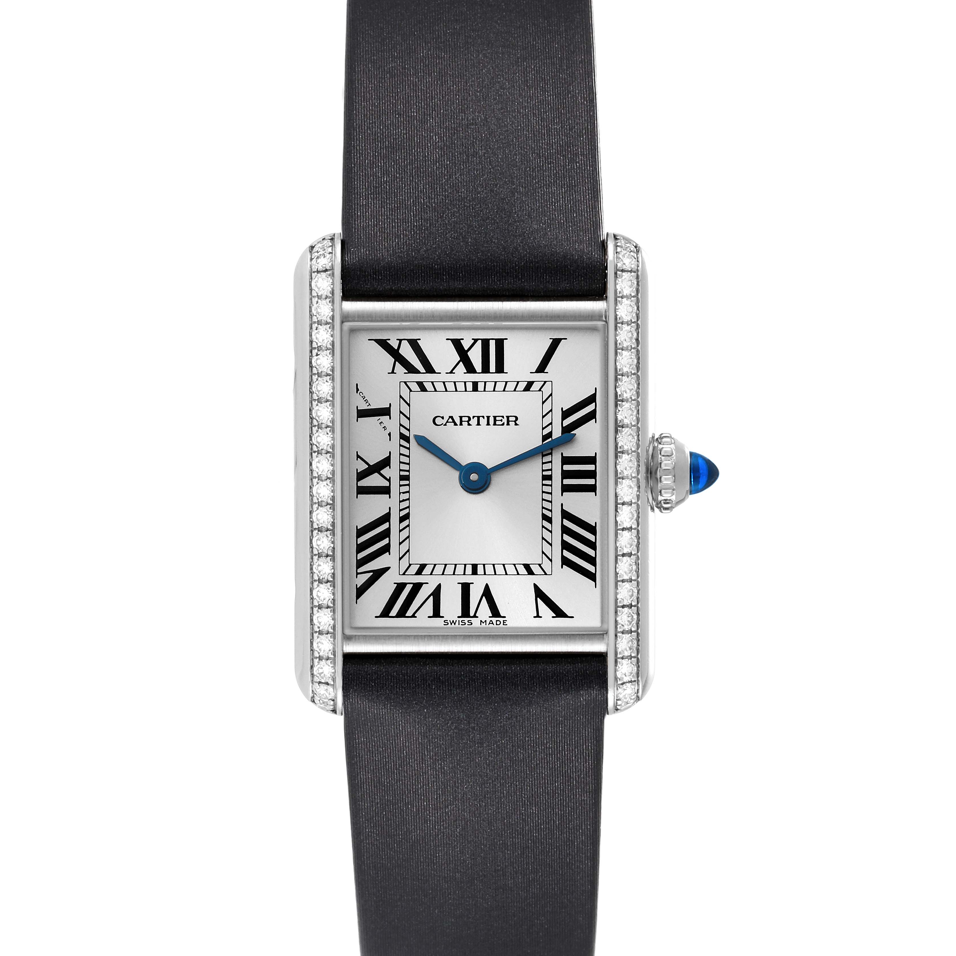 The image shows a Tank Must model wristwatch by Cartier from a front angle, highlighting its face and strap.