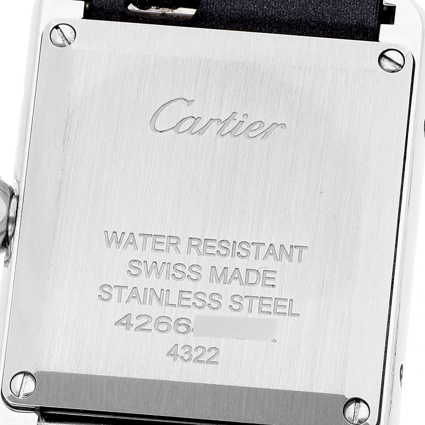 This image shows the back casing of the Cartier Tank Must W4TA0016 Women's Stainless Steel Silver Dial W4TA0016 Women's Stainless Steel Silver Dial watch, highlighting its water resistance and Swiss made details.