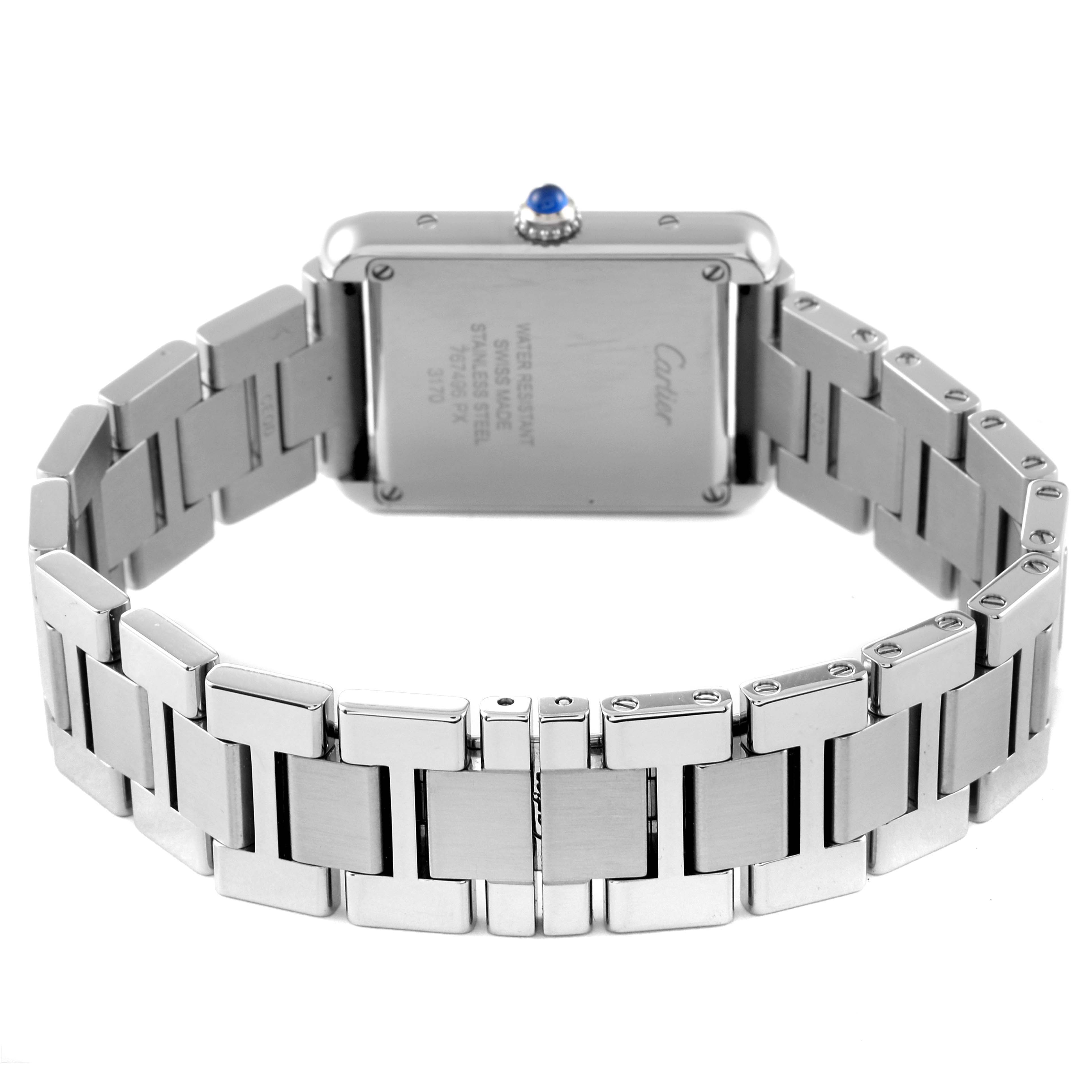 The image shows the rear view of the Cartier Tank Solo W5200013 Women
s Stainless Steel Silver Dial W5200013 Women
s Stainless Steel Silver Dial watch, highlighting its stainless steel back and bracelet.