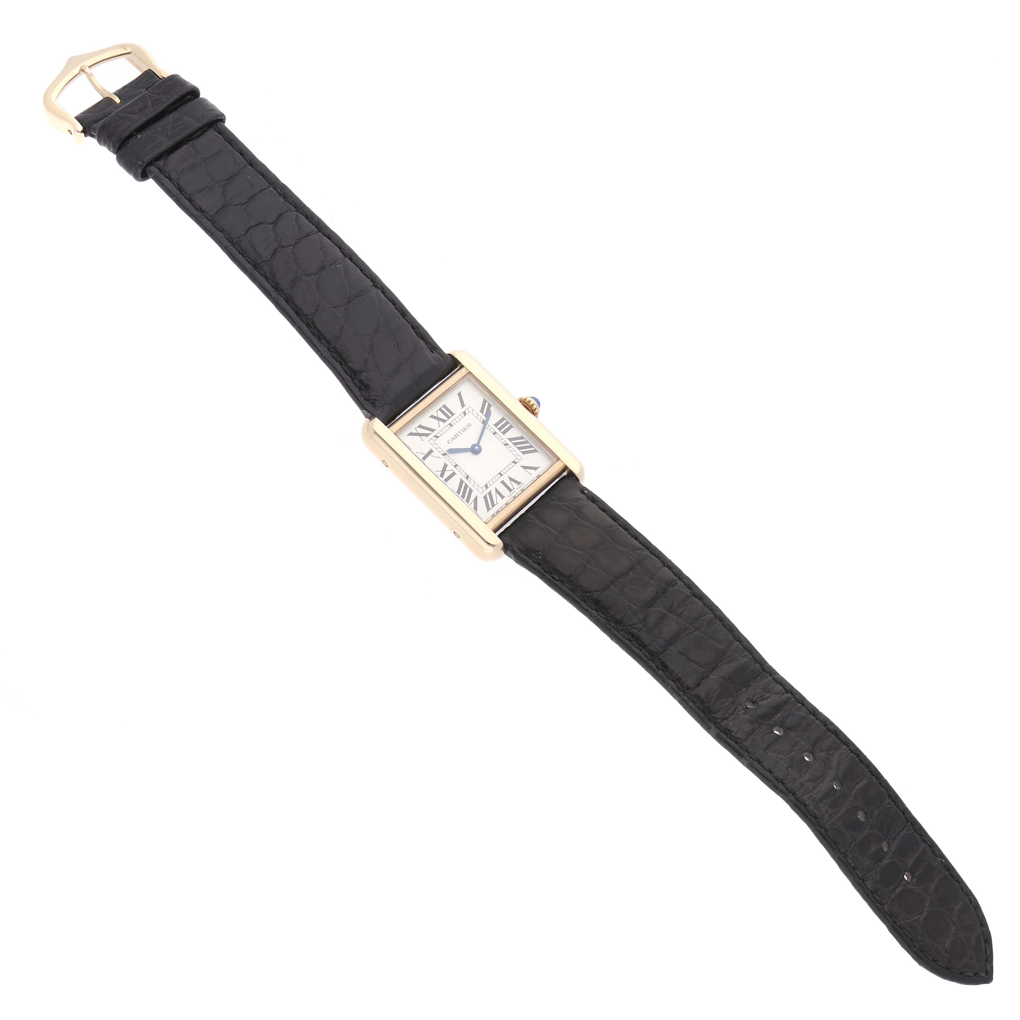 The Cartier Tank Solo W5200002 Women
s Steel and Gold (two tone) Silver Dial watch is shown from a top-down angle, displaying the face, strap, and buckle.