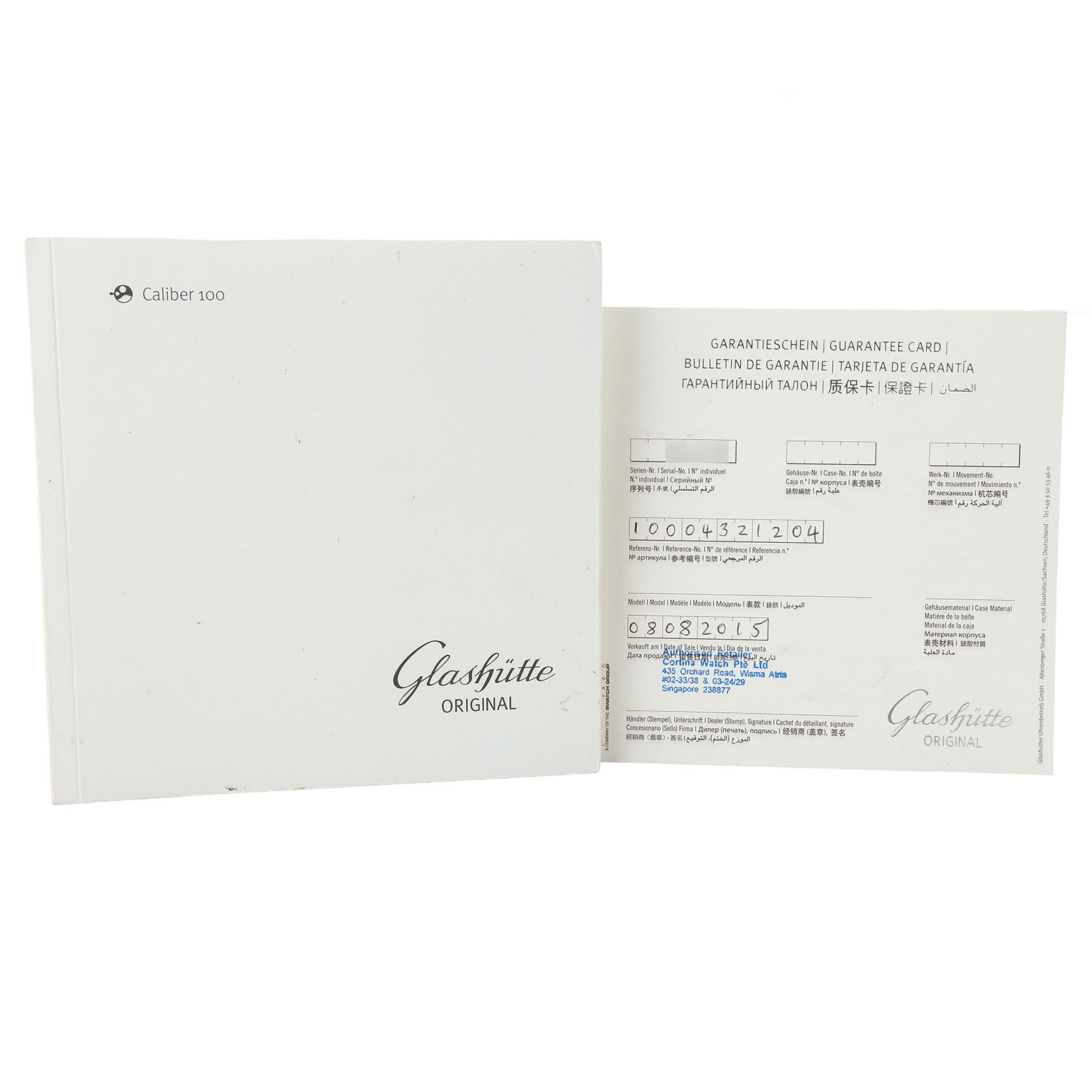 The image shows a guarantee card and manual for the Glashütte Original model, displayed partially open.