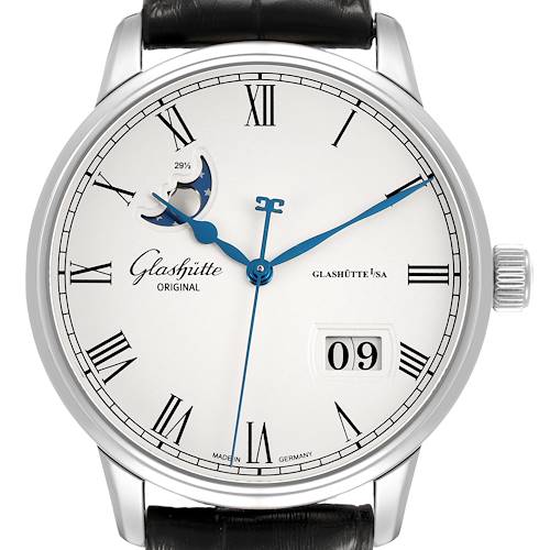 The Glashütte Original watch is shown from a front angle, featuring Roman numerals, a moon phase, and a date display.