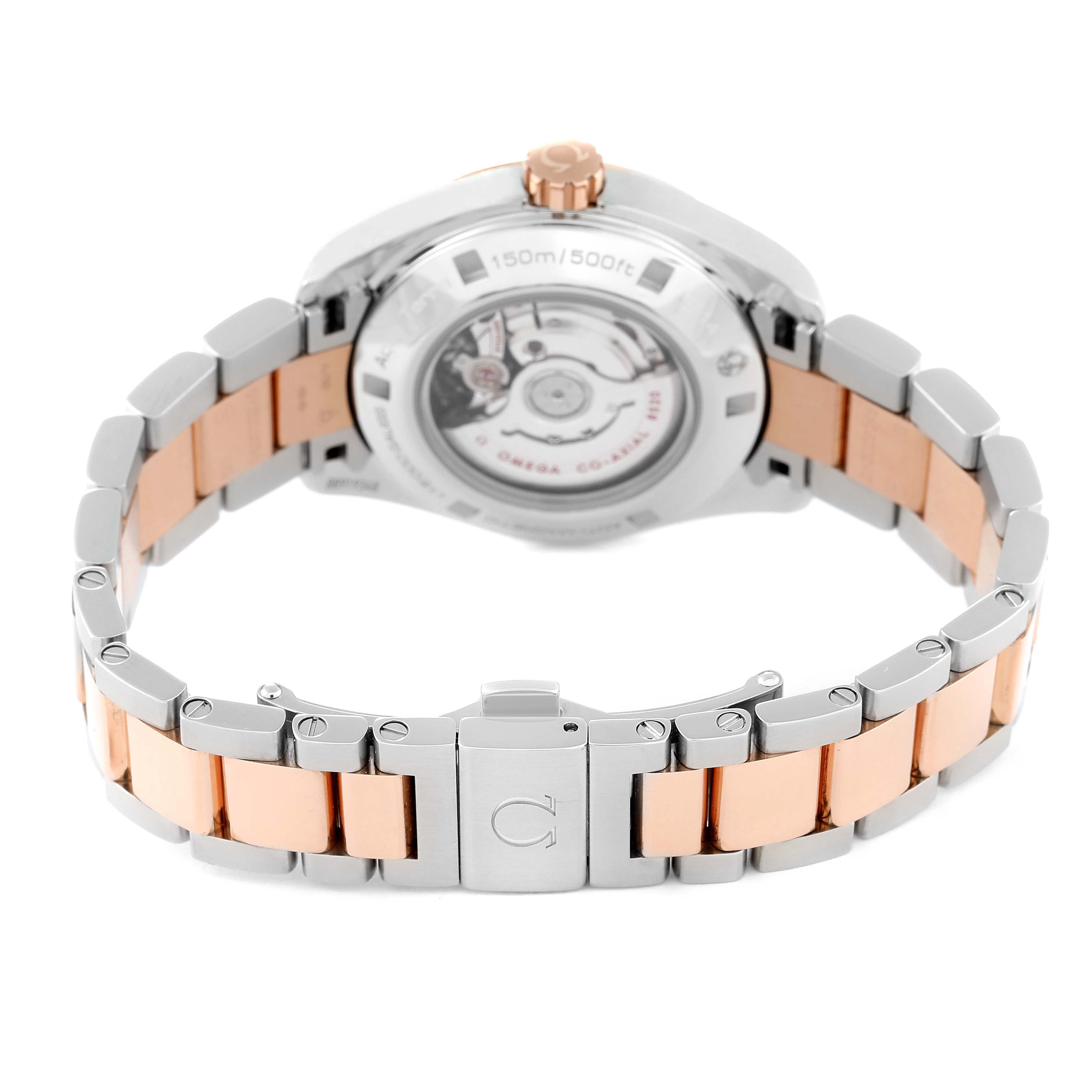 The image shows the back view of the Omega 231.20.34.20.55.001 Women
s Steel and Gold (two tone) Mother of Pearl Dial 231.20.34.20.55.001 Women
s Steel and Gold (two tone) Mother of Pearl Dial Aqua Terra Rose Gold MOP Diamond Ladies Watch 231.20.34.20.55.001, focusing on the clasp and bracelet.