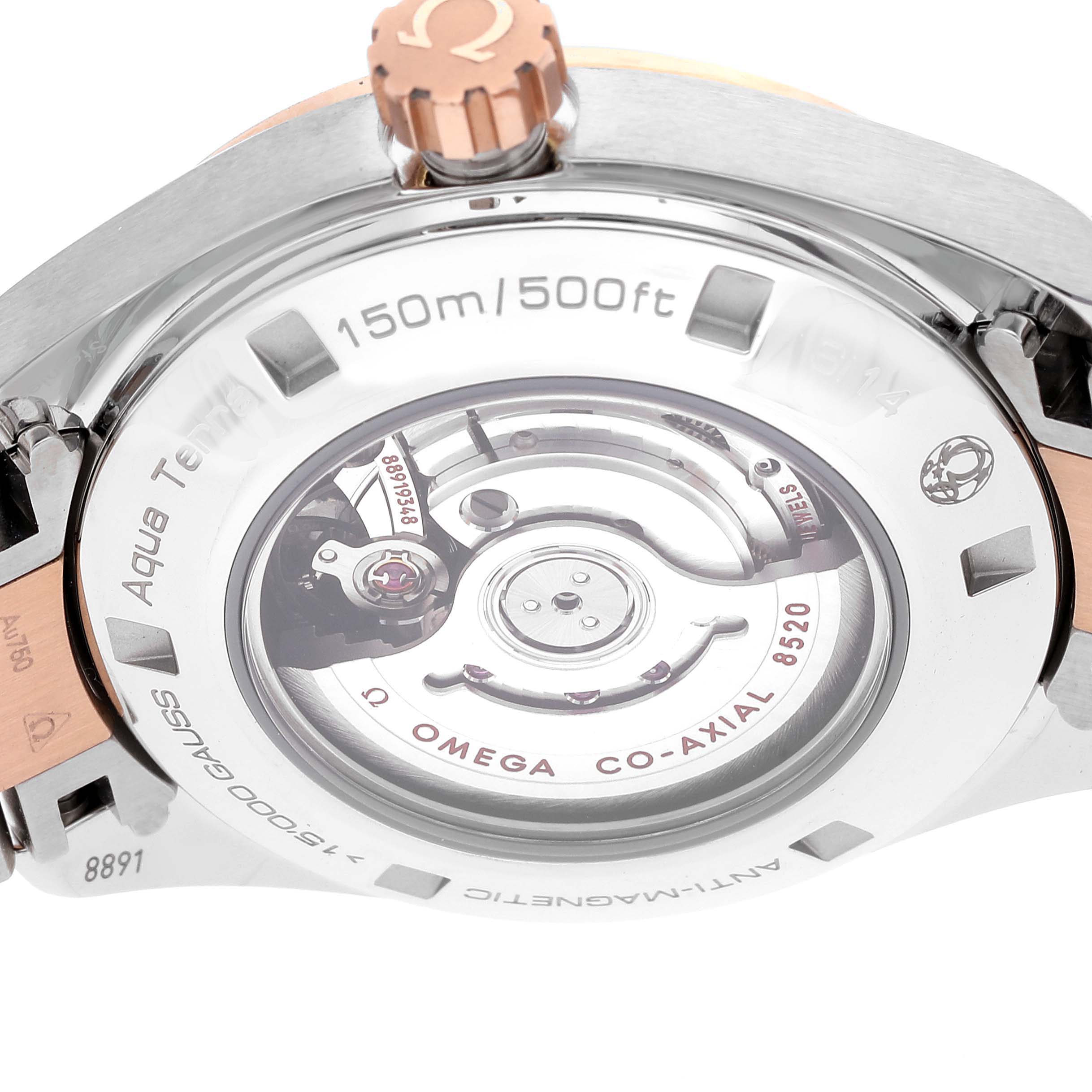 The image shows the back and crown of an Omega 231.20.34.20.55.001 Women
s Steel and Gold (two tone) Mother of Pearl Dial 231.20.34.20.55.001 Women
s Steel and Gold (two tone) Mother of Pearl Dial Aqua Terra Rose Gold MOP Diamond Ladies Watch model 231.20.34.20.55.001.