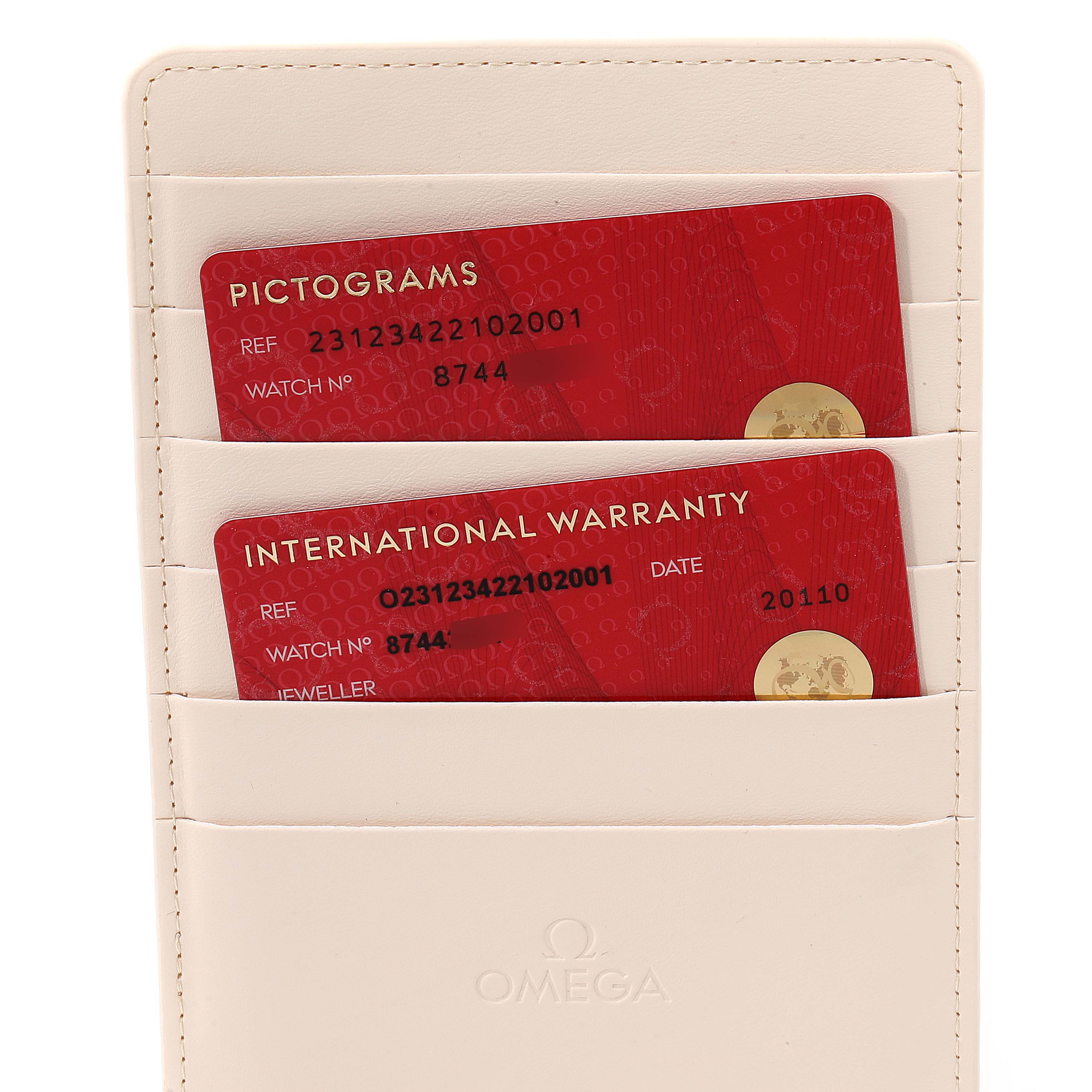 The image shows warranty and pictogram cards for the Omega Aqua Terra 231.23.42.21.02.001 Men's Steel and Gold (two tone) Silver Dial 231.23.42.21.02.001 Men's Steel and Gold (two tone) Silver Dial watch, inside a cream-colored cardholder.