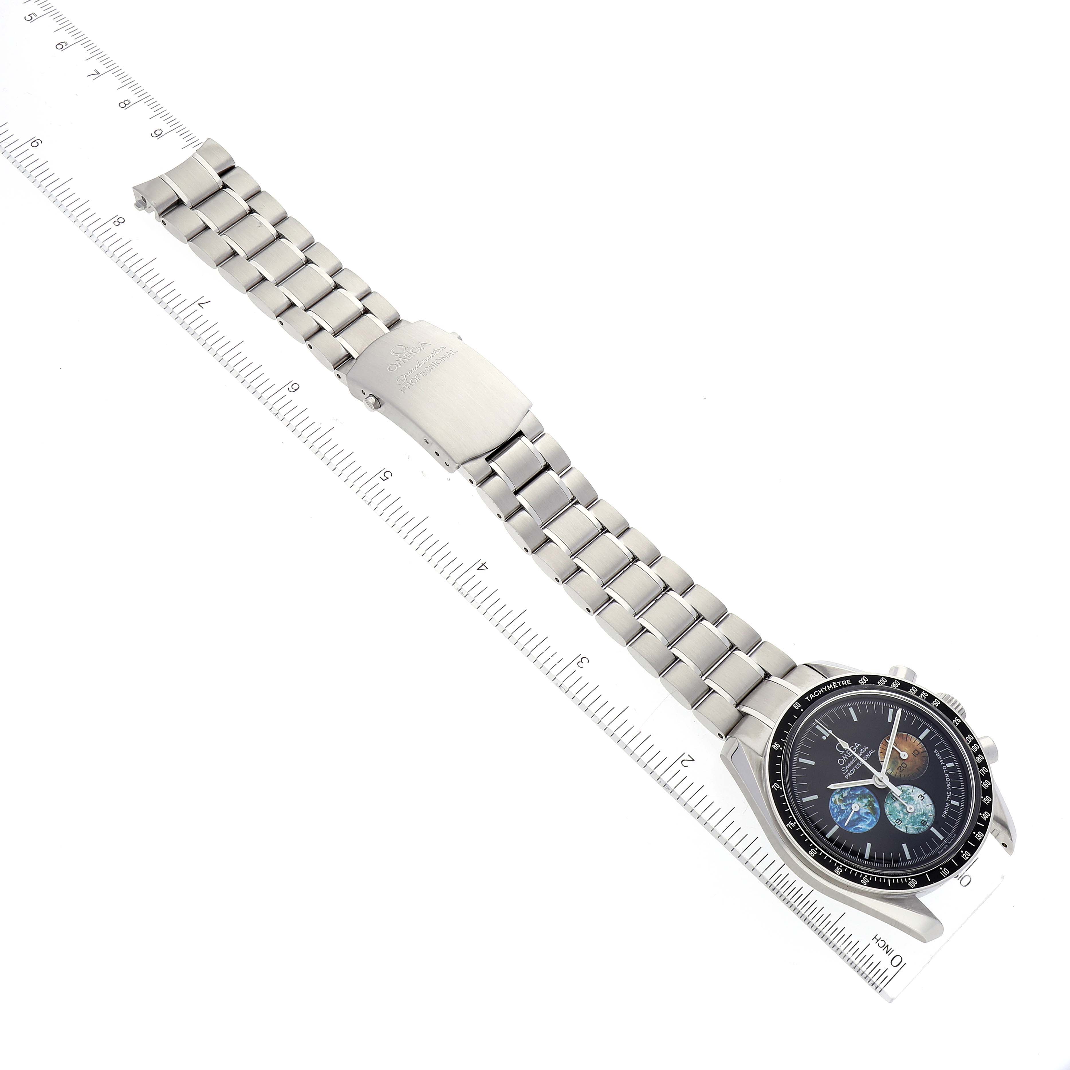 The Omega Speedmaster 3577.50.00 Men's Stainless Steel Black Dial 3577.50.00 Men's Stainless Steel Black Dial watch is shown laid flat with its full bracelet extended and a ruler used for scale.