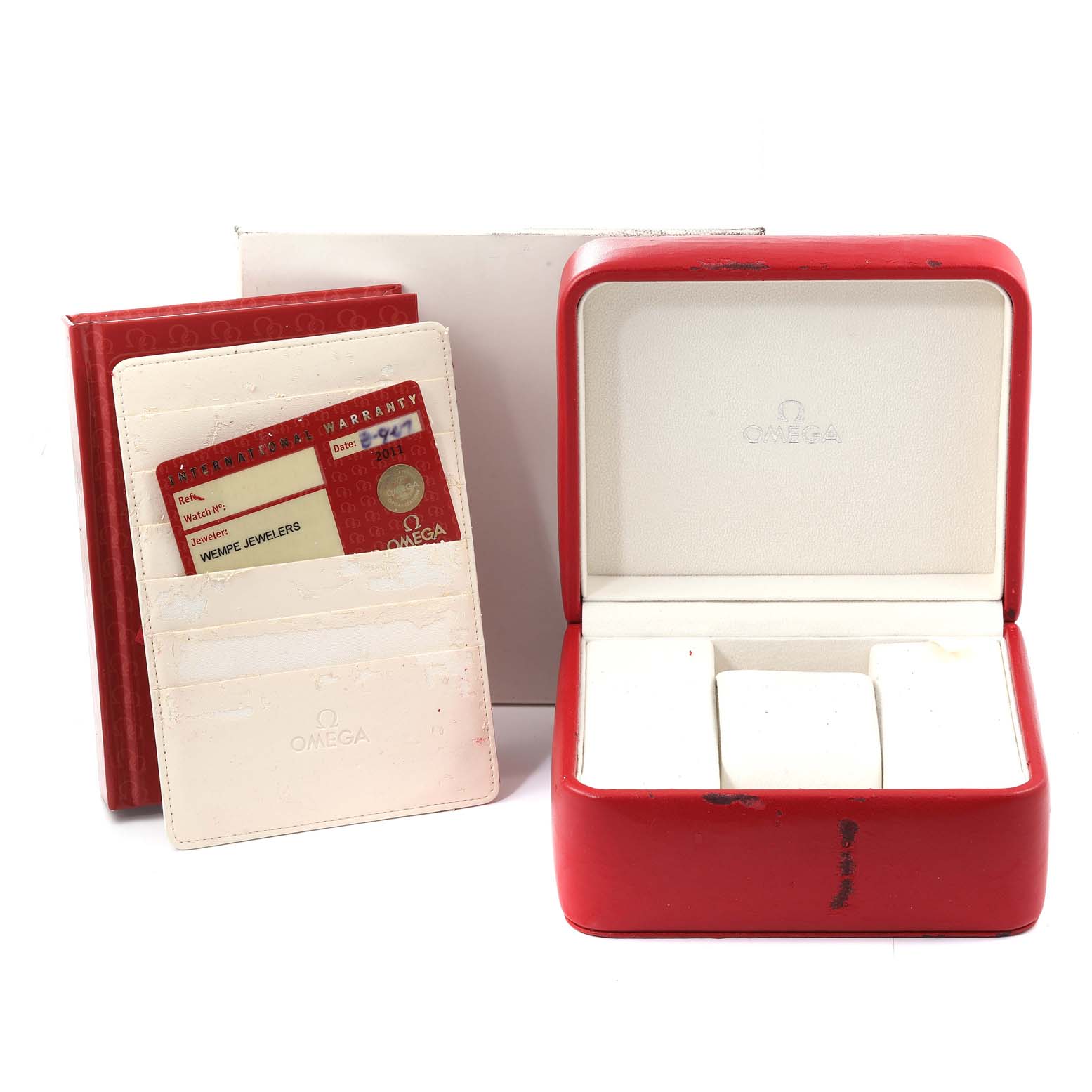 The image shows an Omega Speedmaster 3577.50.00 Men's Stainless Steel Black Dial 3577.50.00 Men's Stainless Steel Black Dial watch box, warranty card, and cardholder from a front angle.