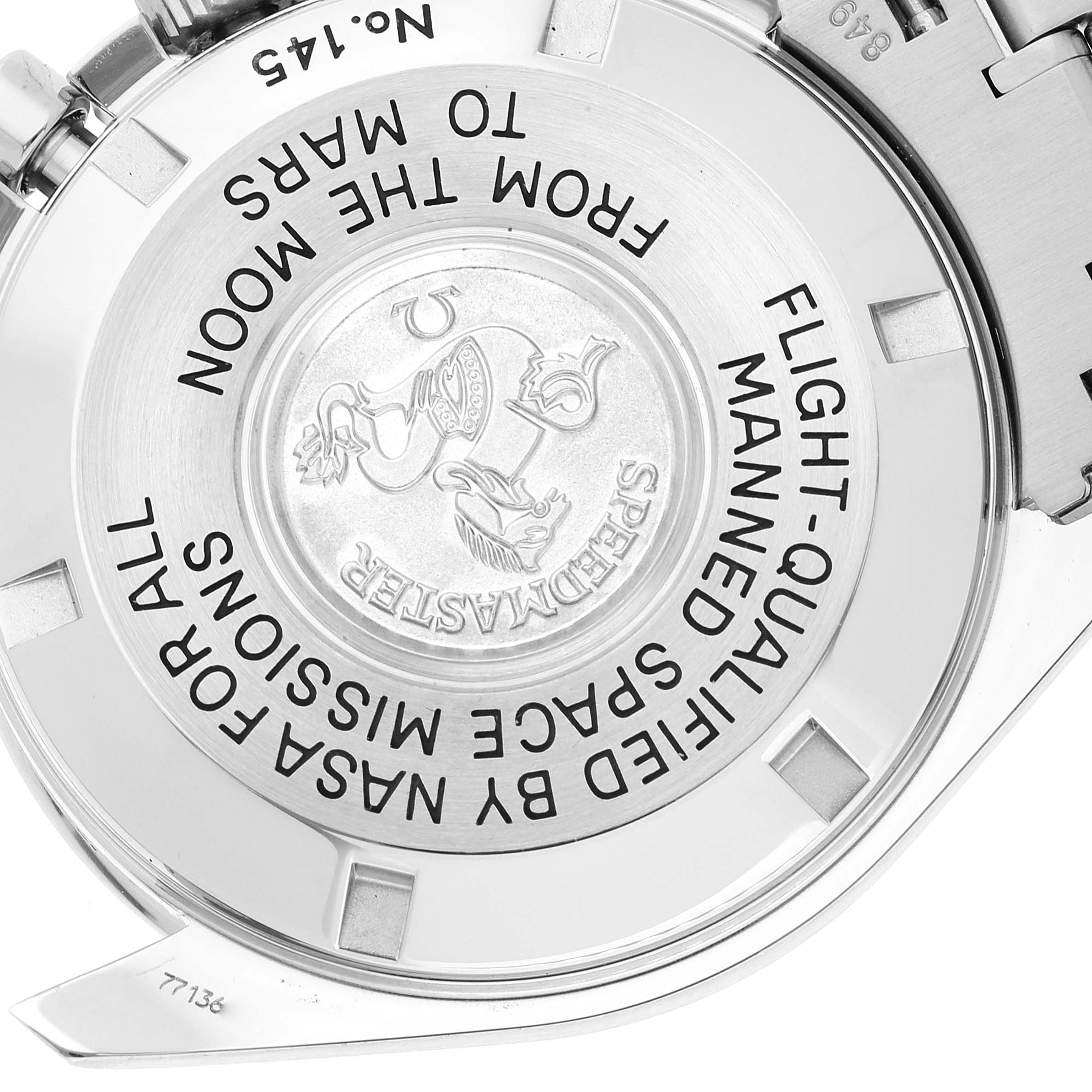 The image shows the case back of an Omega Speedmaster 3577.50.00 Men's Stainless Steel Black Dial 3577.50.00 Men's Stainless Steel Black Dial watch, highlighting the engraved text and emblem.