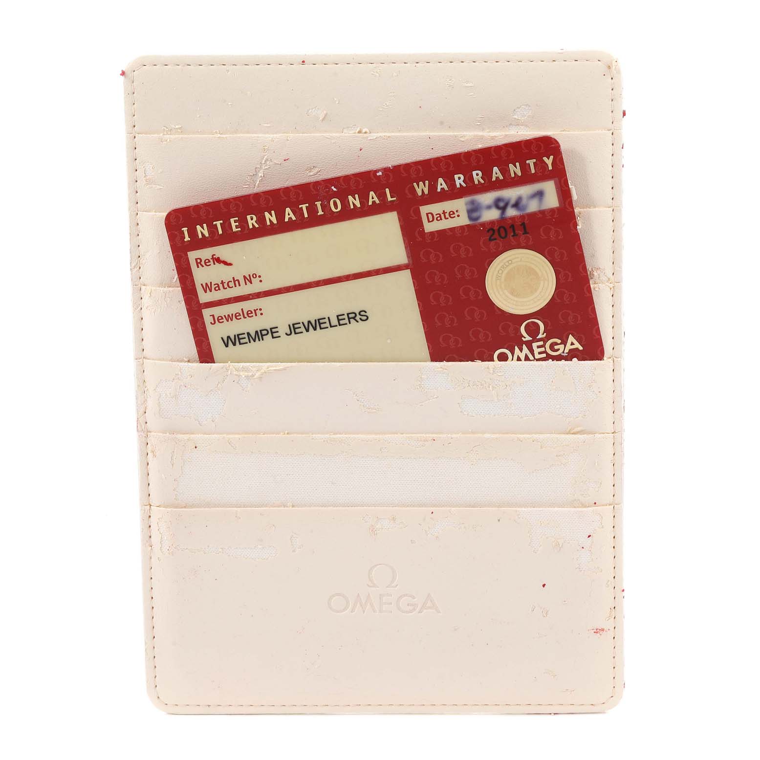 This image features an Omega Speedmaster 3577.50.00 Men's Stainless Steel Black Dial 3577.50.00 Men's Stainless Steel Black Dial International Warranty card in a cream-colored cardholder.