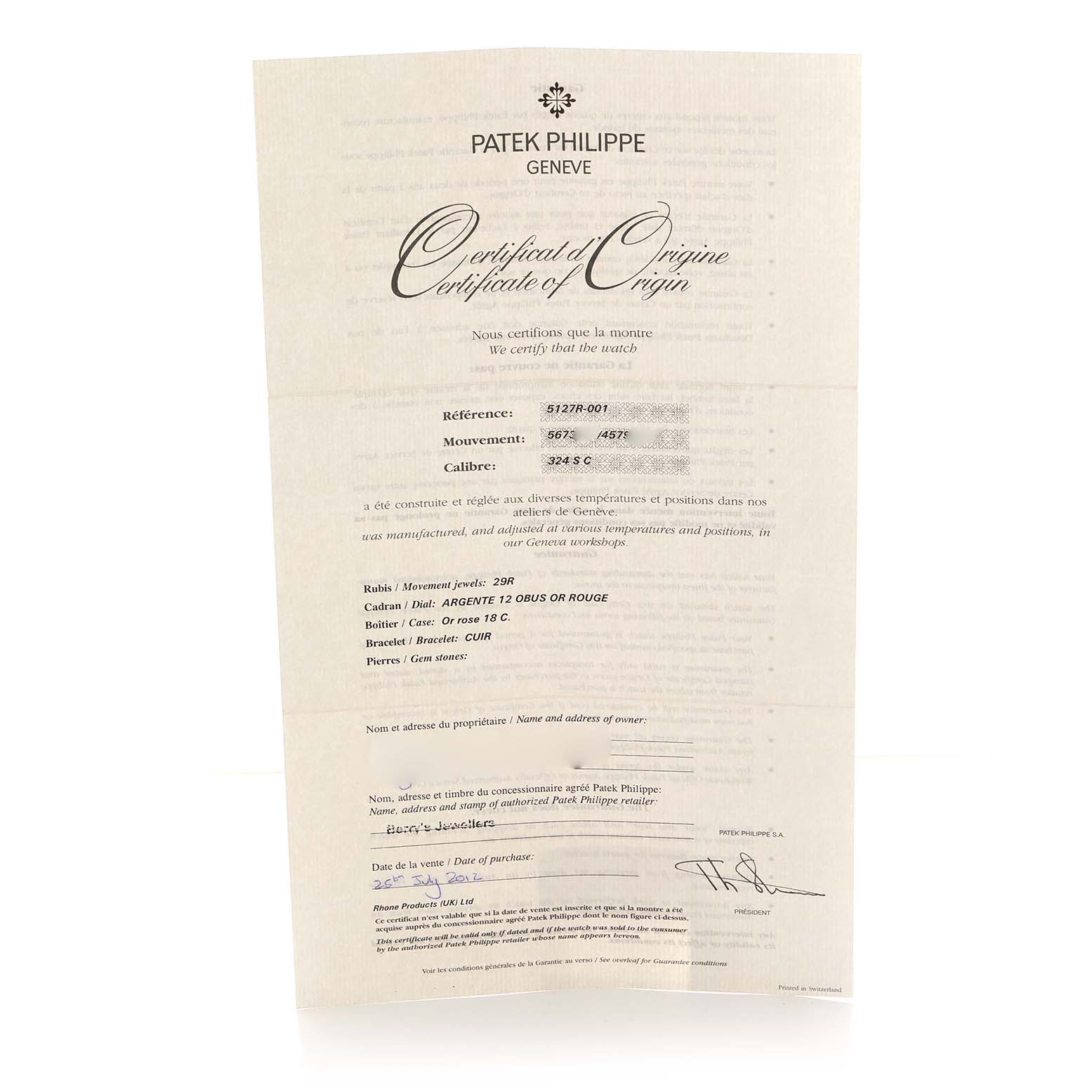 The image shows the "Certificate of Origin" for a Patek Philippe Calatrava 5127R Men
s Rose Gold Silver Dial watch, viewed from the front.