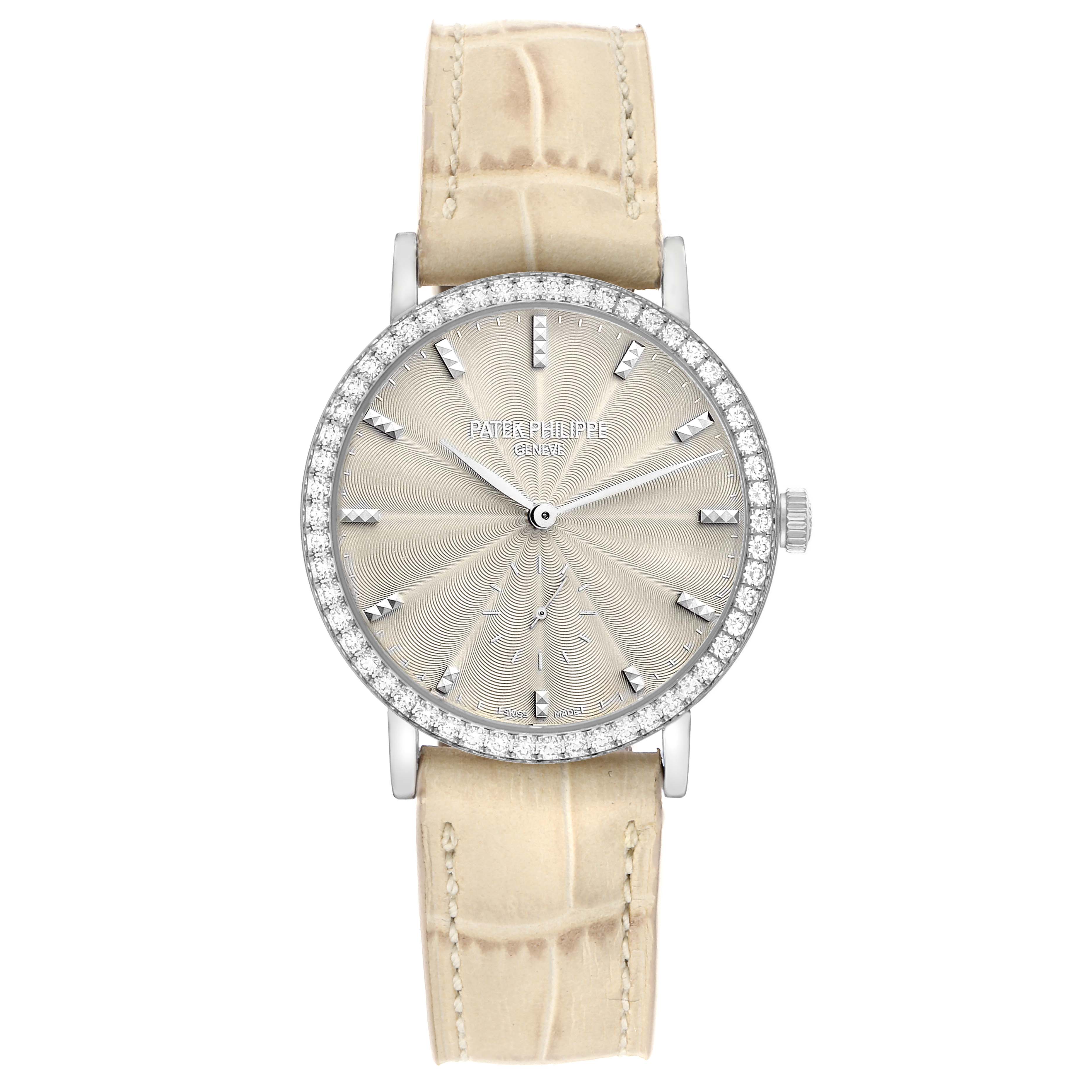 The Patek Philippe Calatrava 7120 Women
s White Gold Beige Dial watch is shown from the front, displaying its dial, bezel, and leather strap.