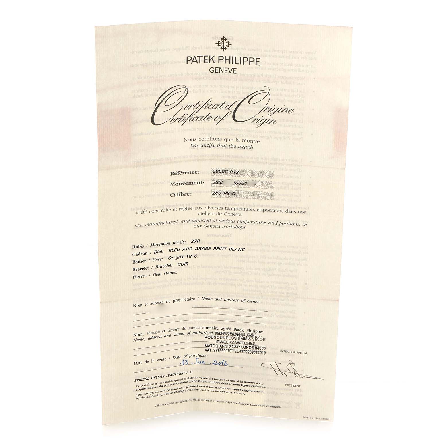 The image shows a Patek Philippe Calatrava 6000G Men
s White Gold Blue Dial certificate of origin, highlighting watch details and specifications.