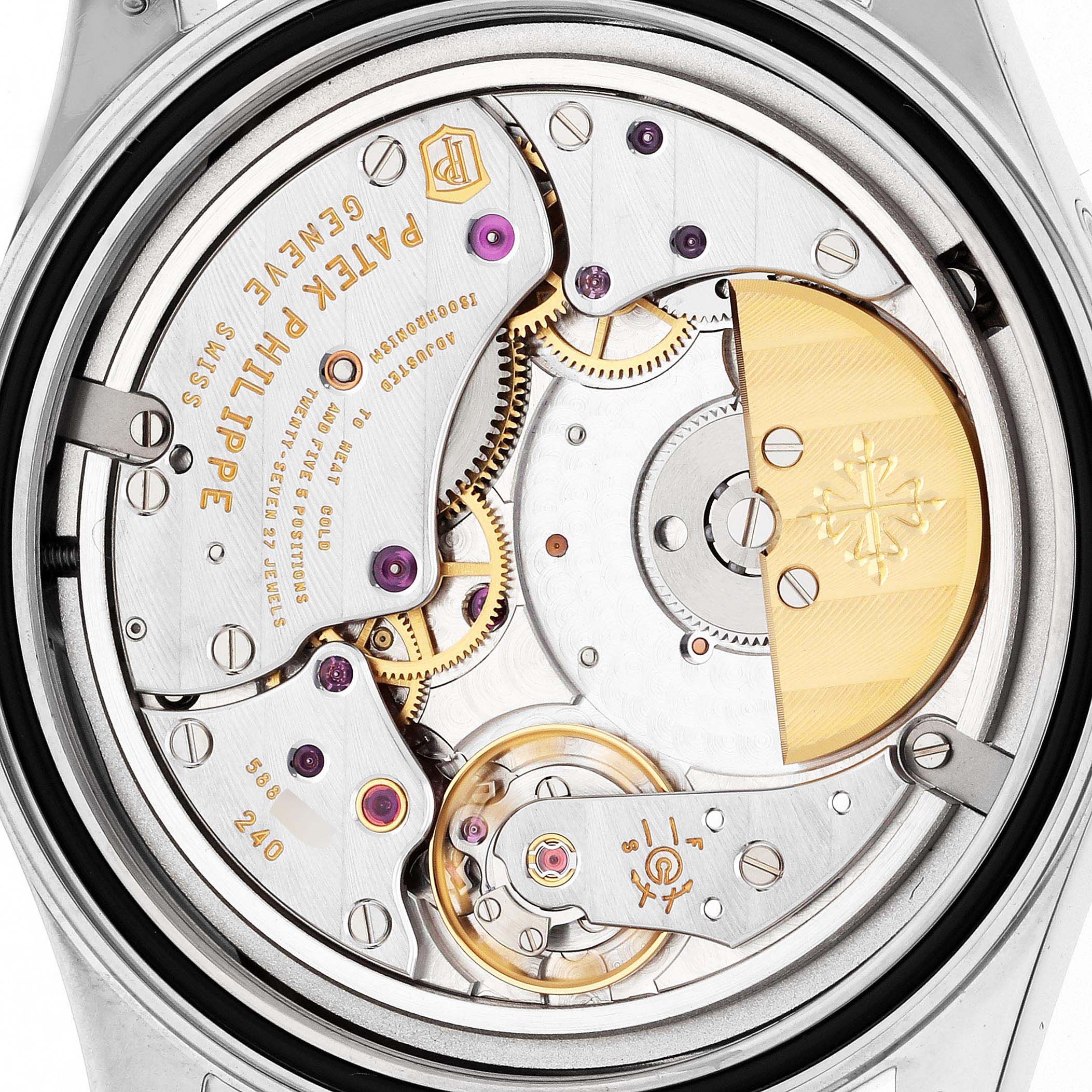 The image shows the back of the Patek Philippe Calatrava 6000G Men
s White Gold Blue Dial, focusing on its intricate movement and components.