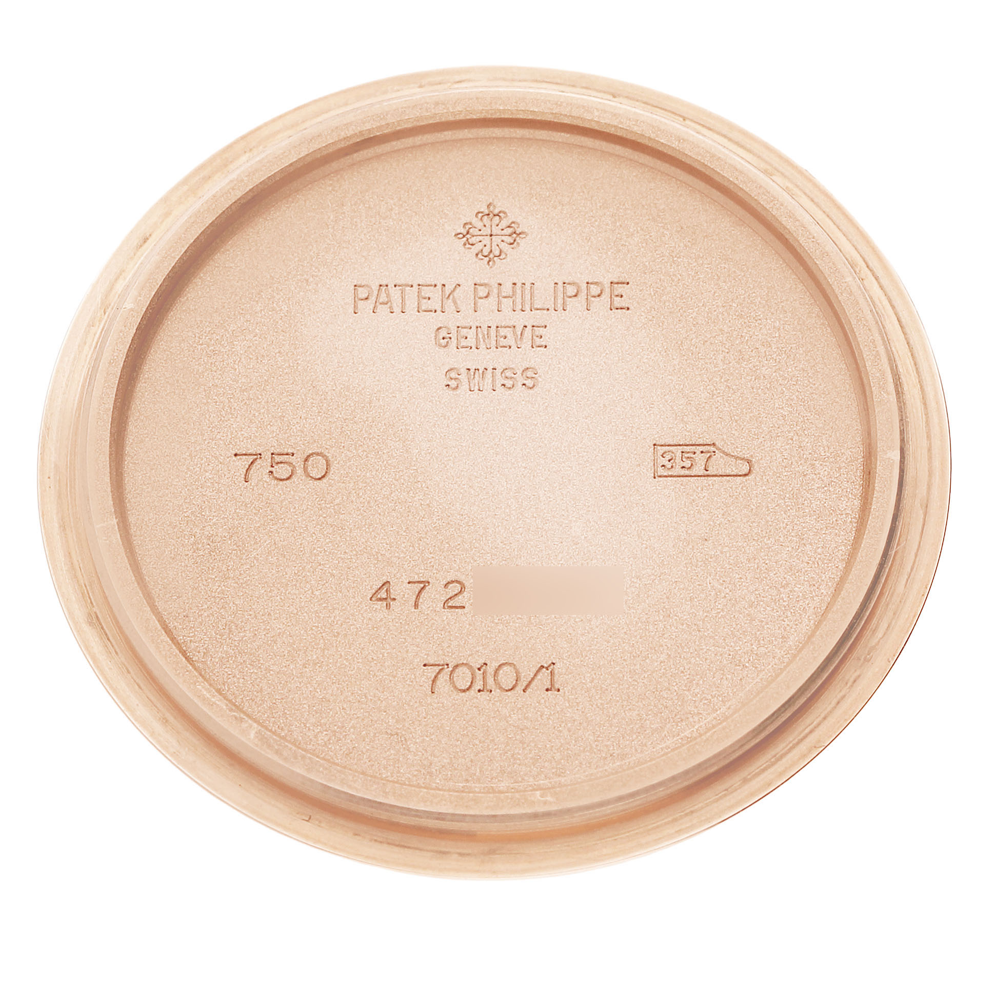 The image shows the case back interior of a Patek Philippe Nautilus 7010R Women's Rose Gold Brown Dial, displaying engravings and model numbers.